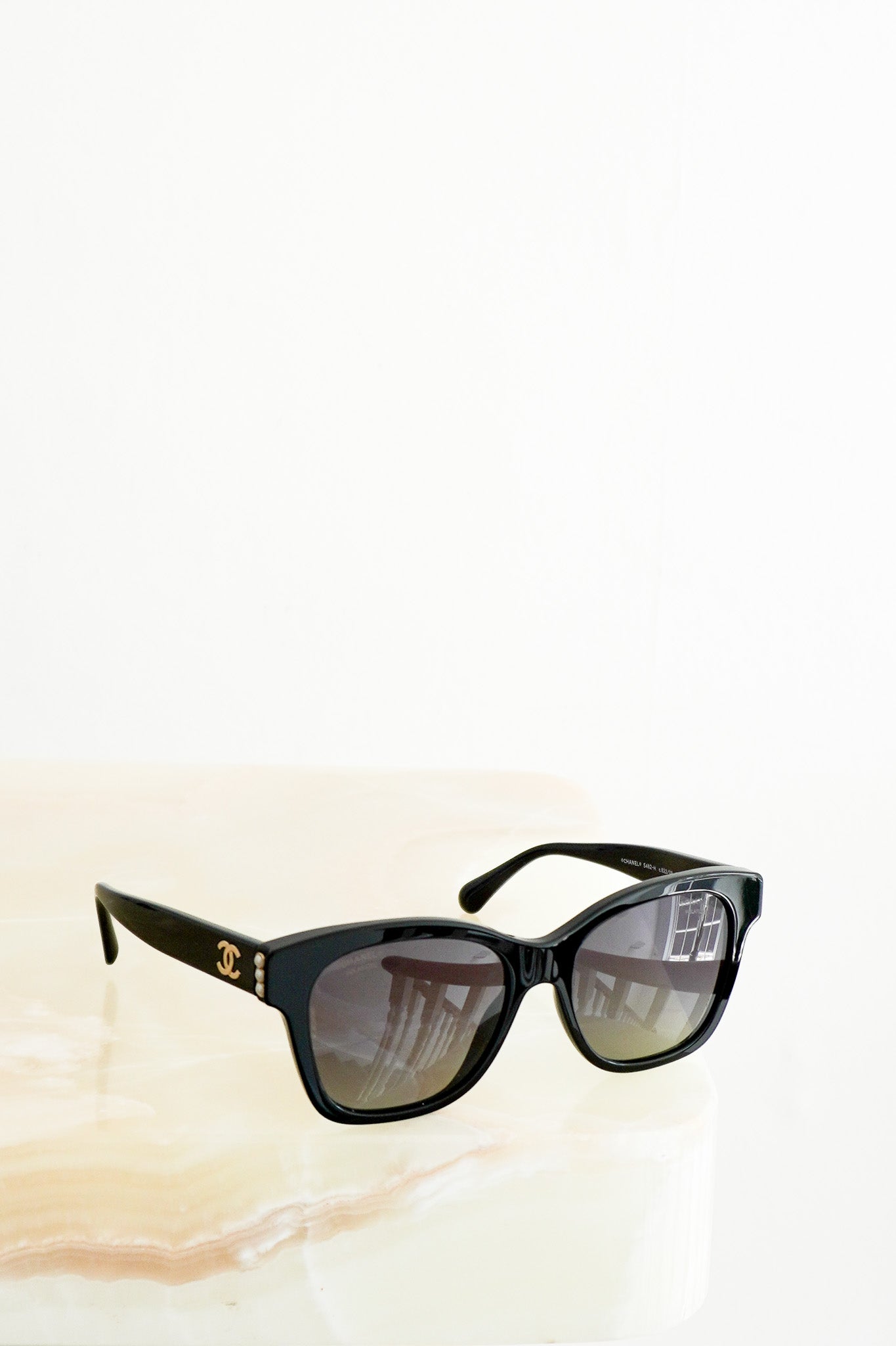 Front image Chanel Pearl-Embellished Square Sunglasses in Black Chelsea London