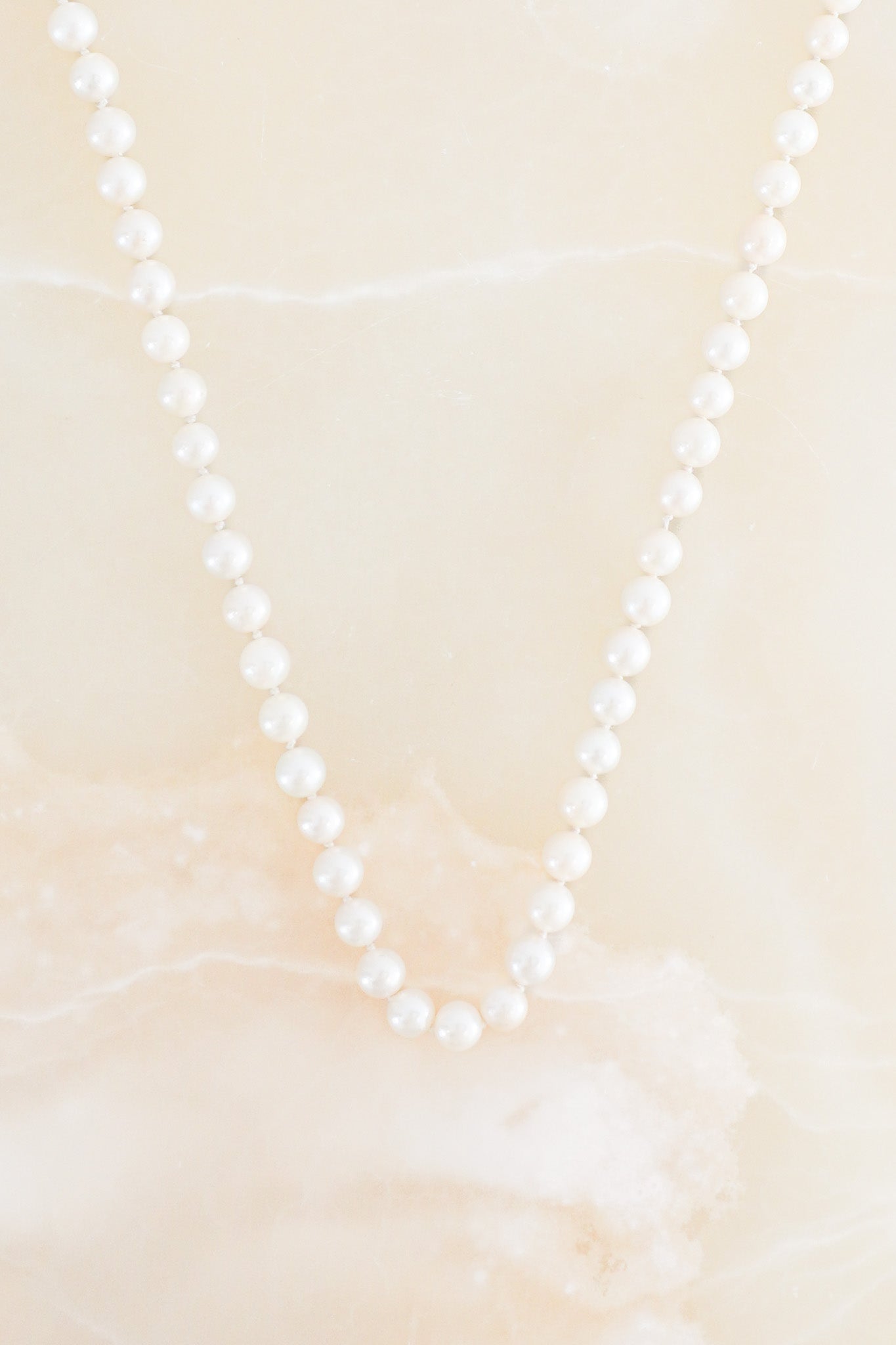 Front image Japanese Vintage Pearl Necklace with Silver Floral Clasp