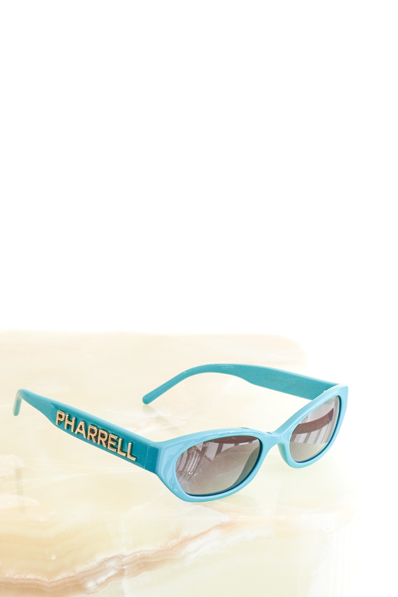 Front image of the Chanel x Pharrell Williams Teal Sunglasses Chelsea London