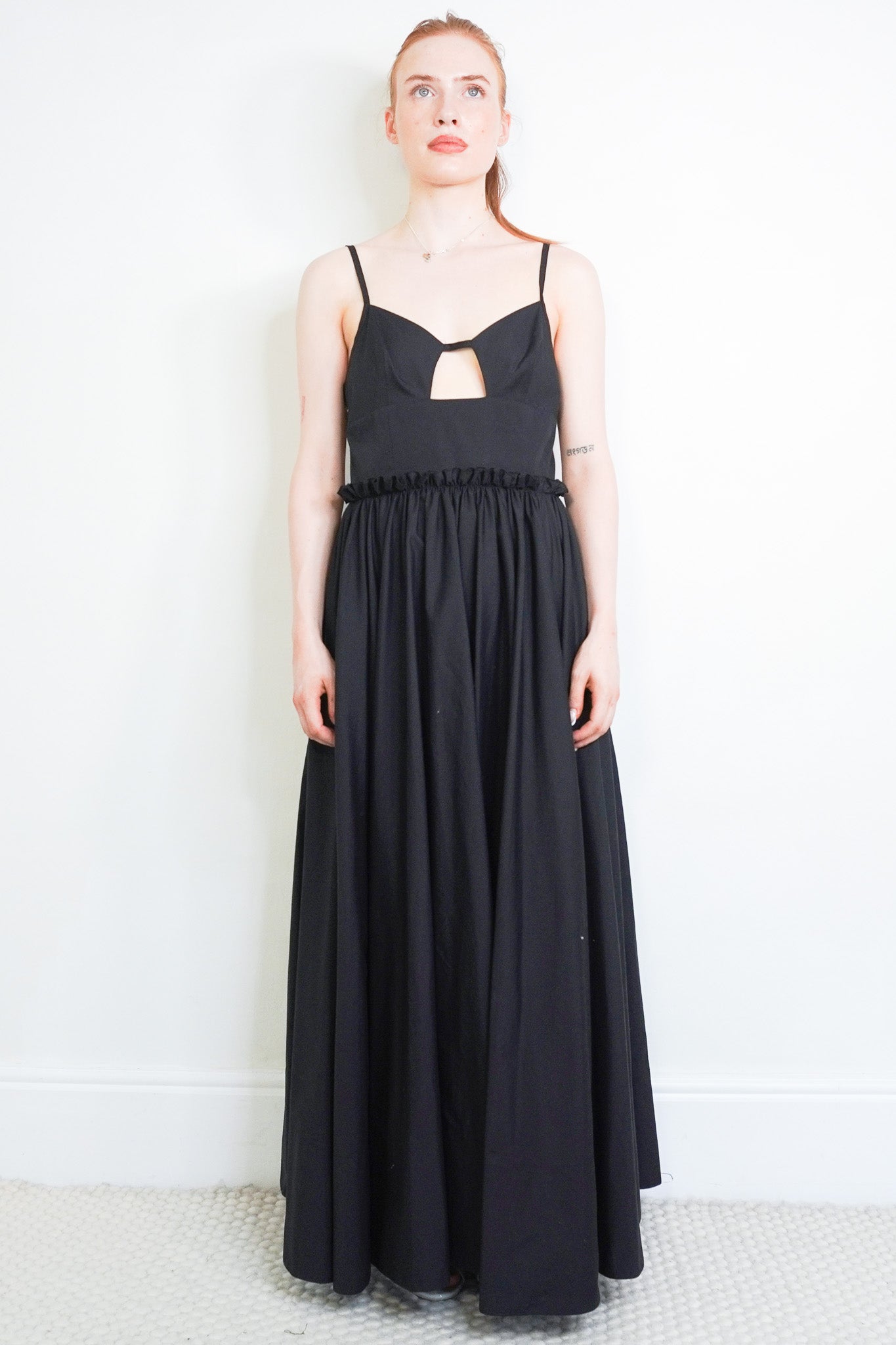 Front image of the Goop. Black Dress Chelsea London