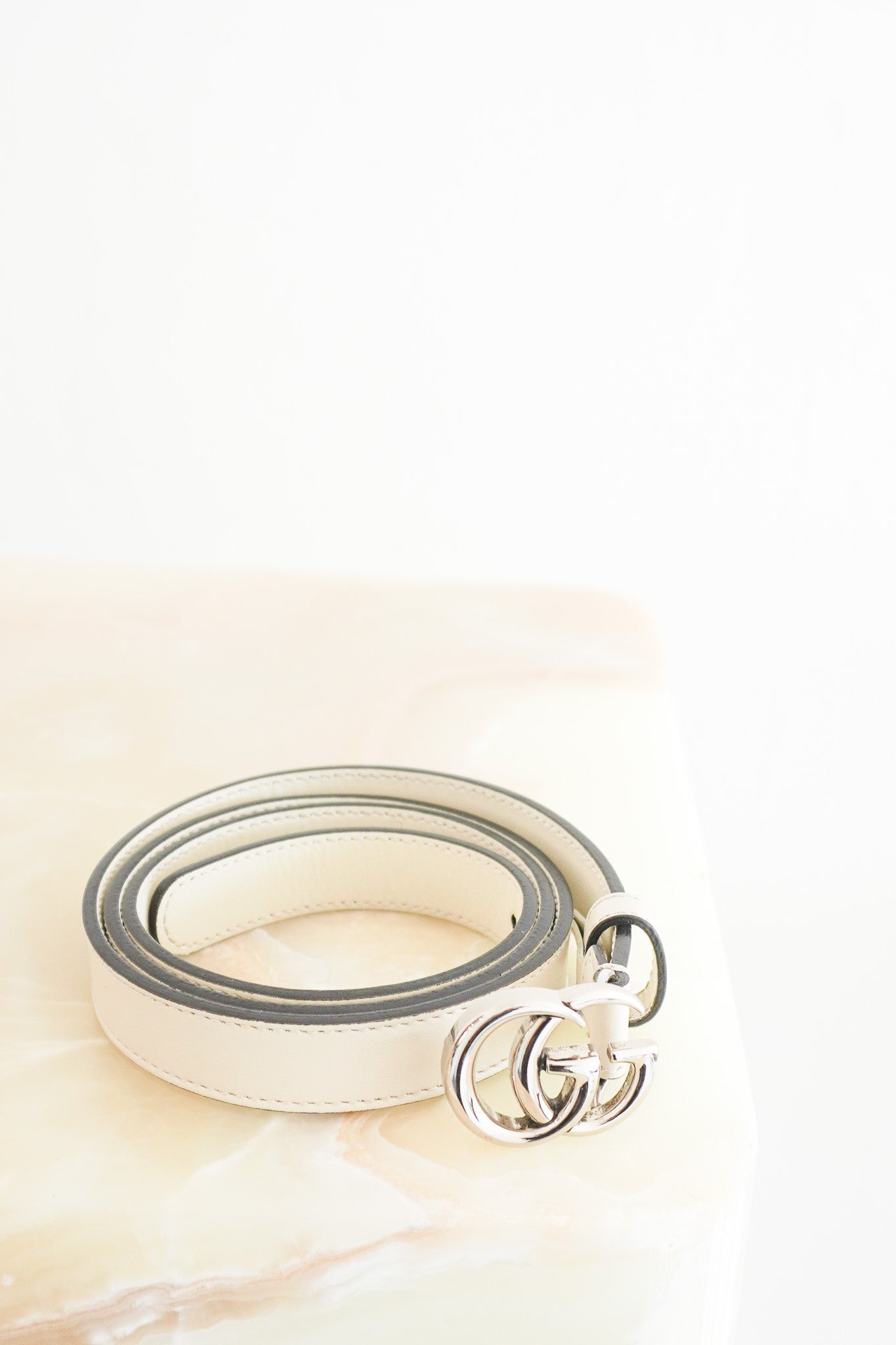 Front image of the Gucci Marmont Thin White Leather Belt Chelsea london