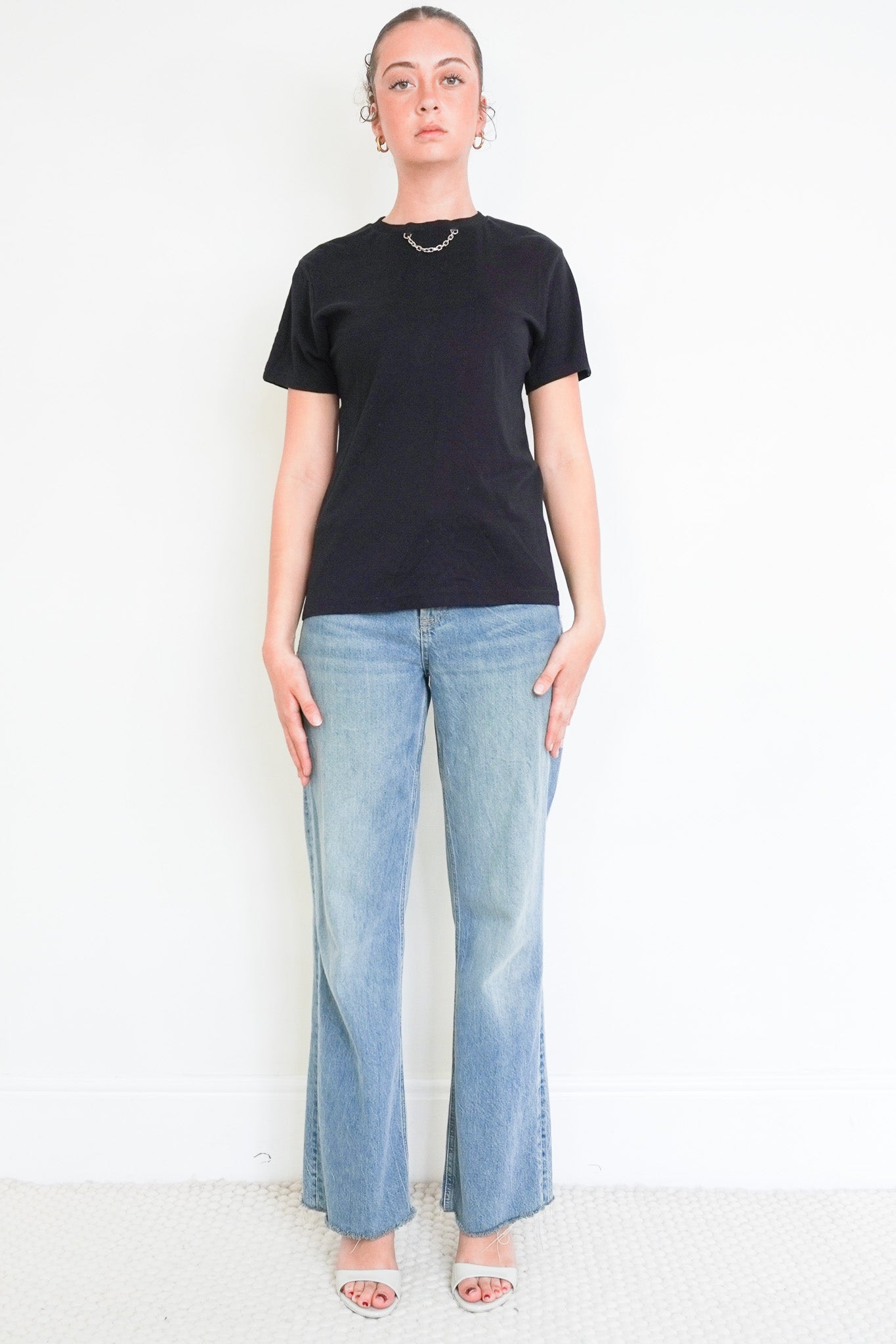 Front image of the Louis Vuitton T-Shirt in Black with chain detail Chelsea London