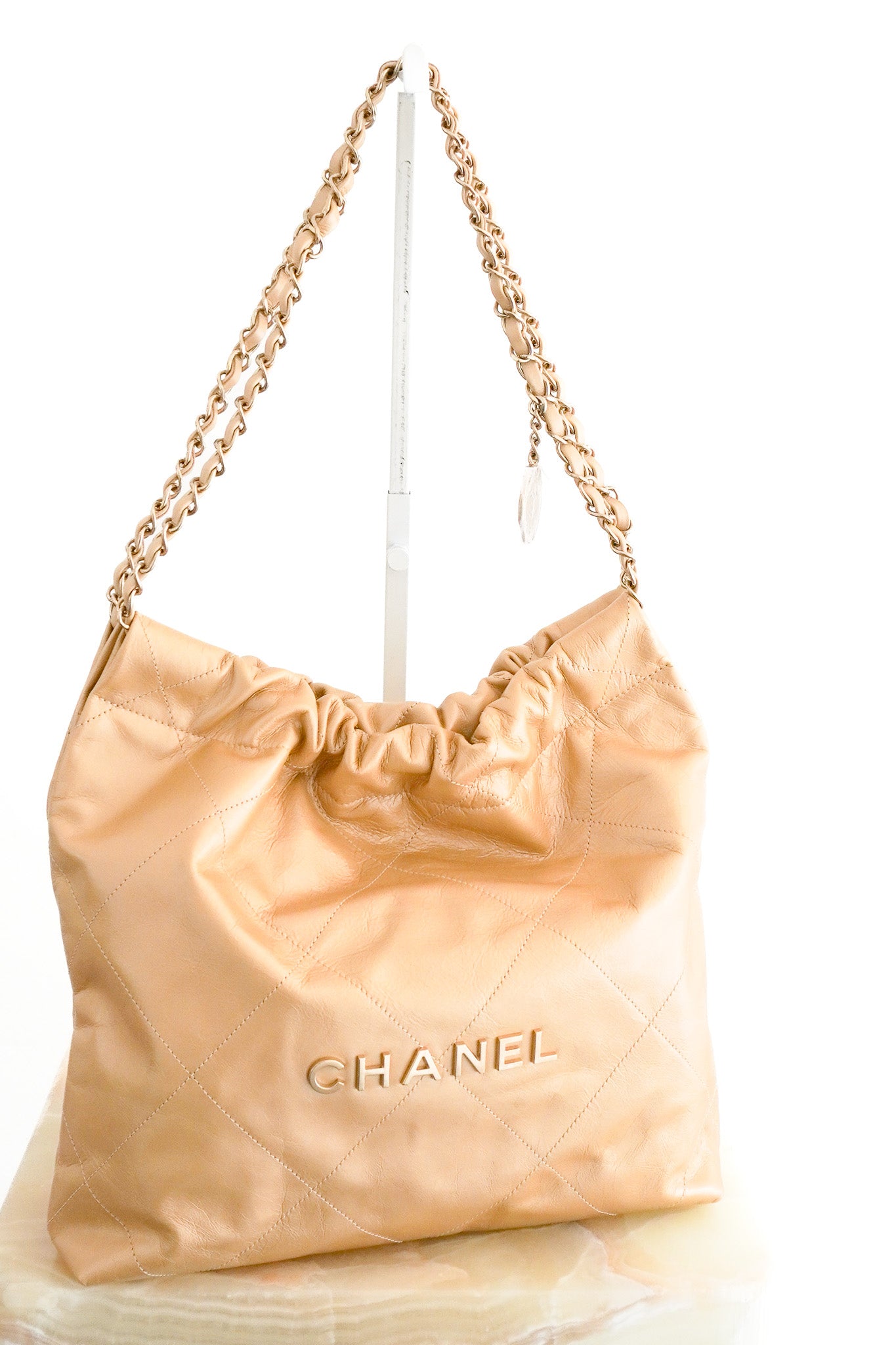 Front image of the NEW Chanel 22 Small Hobo Bag in Gold Shiny Calfskin Chelsea London