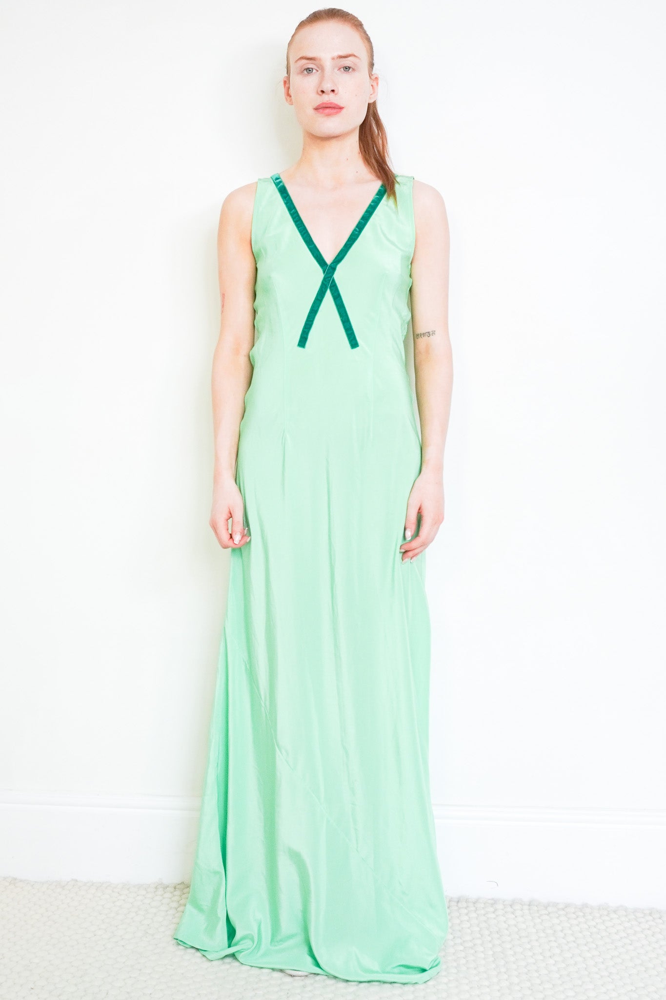 Front image of the Serena Bute V Neck Green Dress Chelsea London