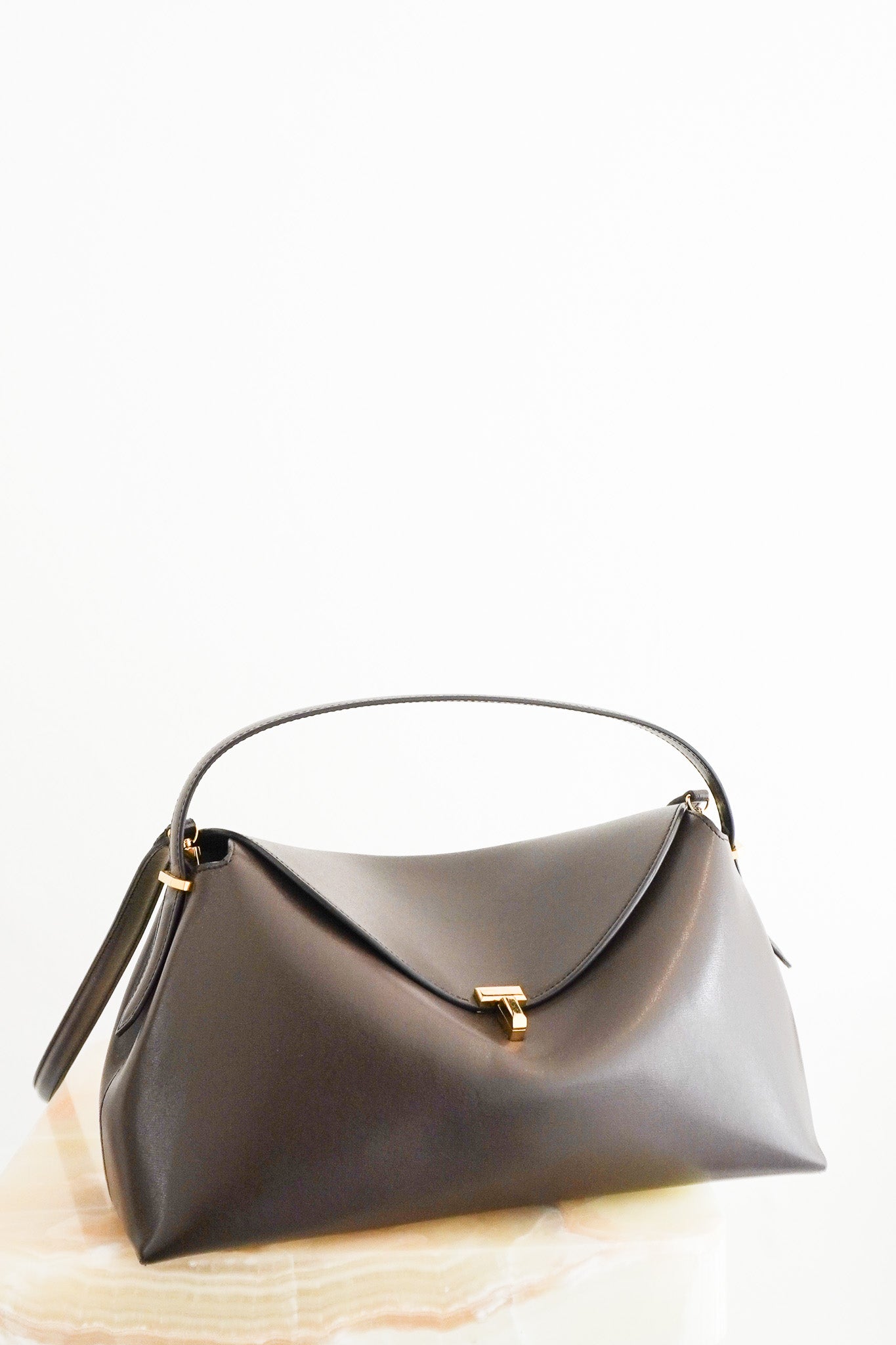 Front image of the Toteme T-Lock Top Handle Bark Bag Chelsea London