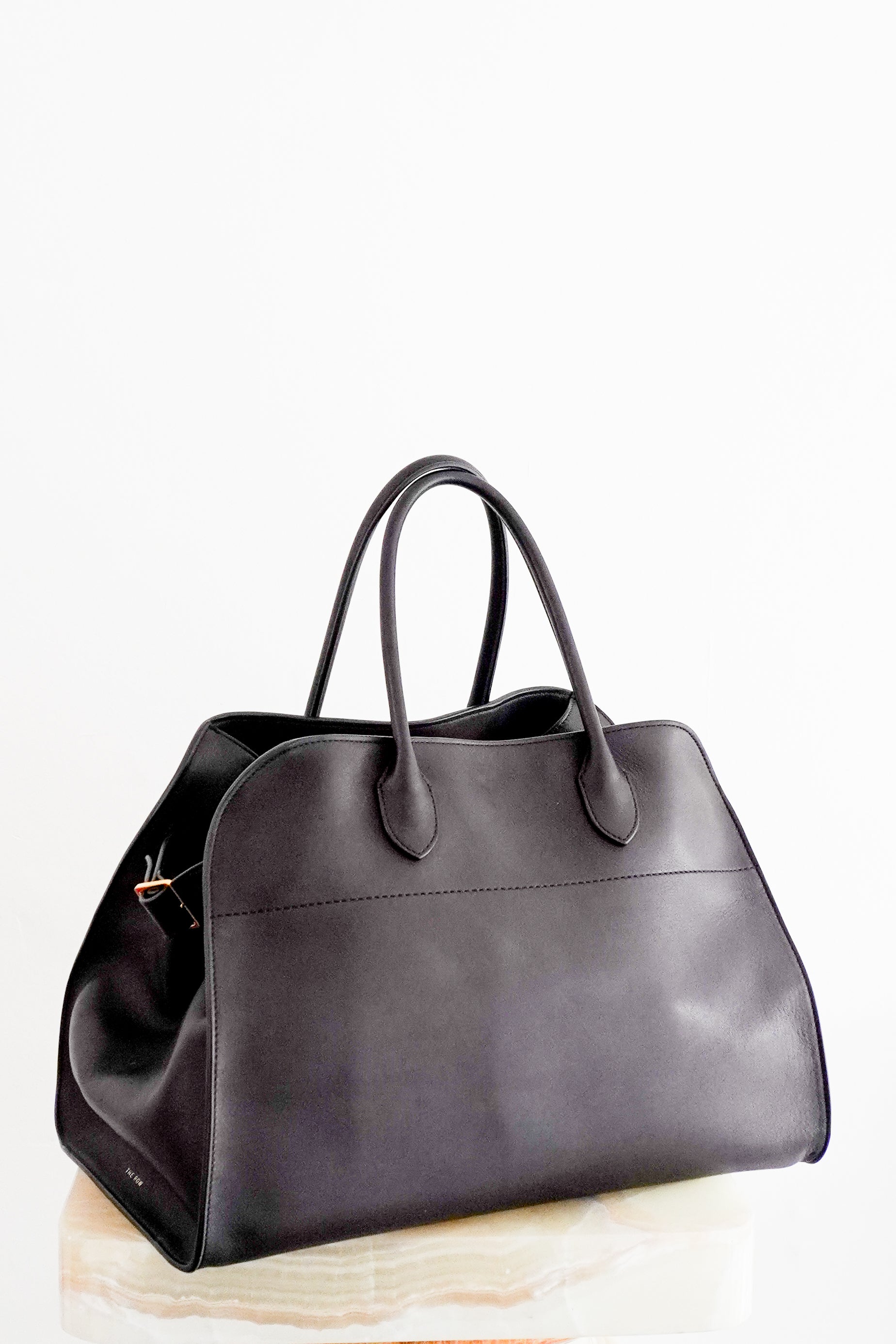 Front photo of The Row Black Margaux Shoulder Bag Chelsea London