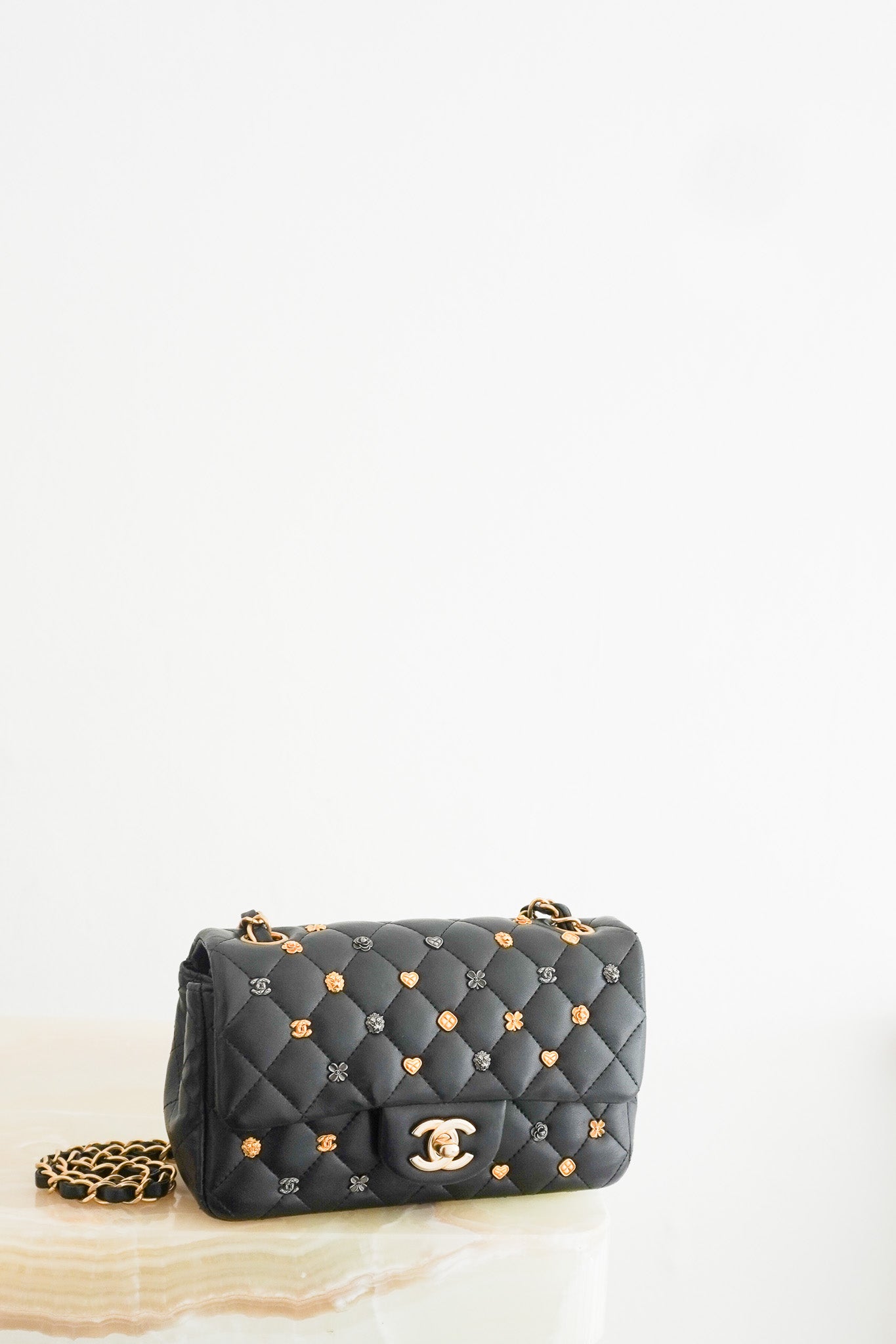 Front photo of the Chanel Mini Lucky Charms Rectangular Flap Bag in Black Lambskin Chelsea London