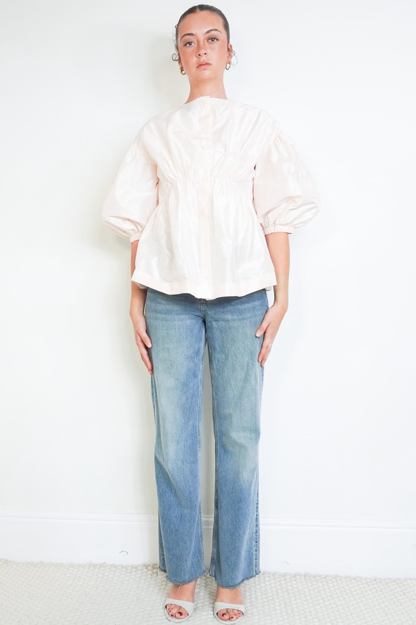 Front photo of the Simone Rocha Pink Gathered Peplum Top Chelsea London