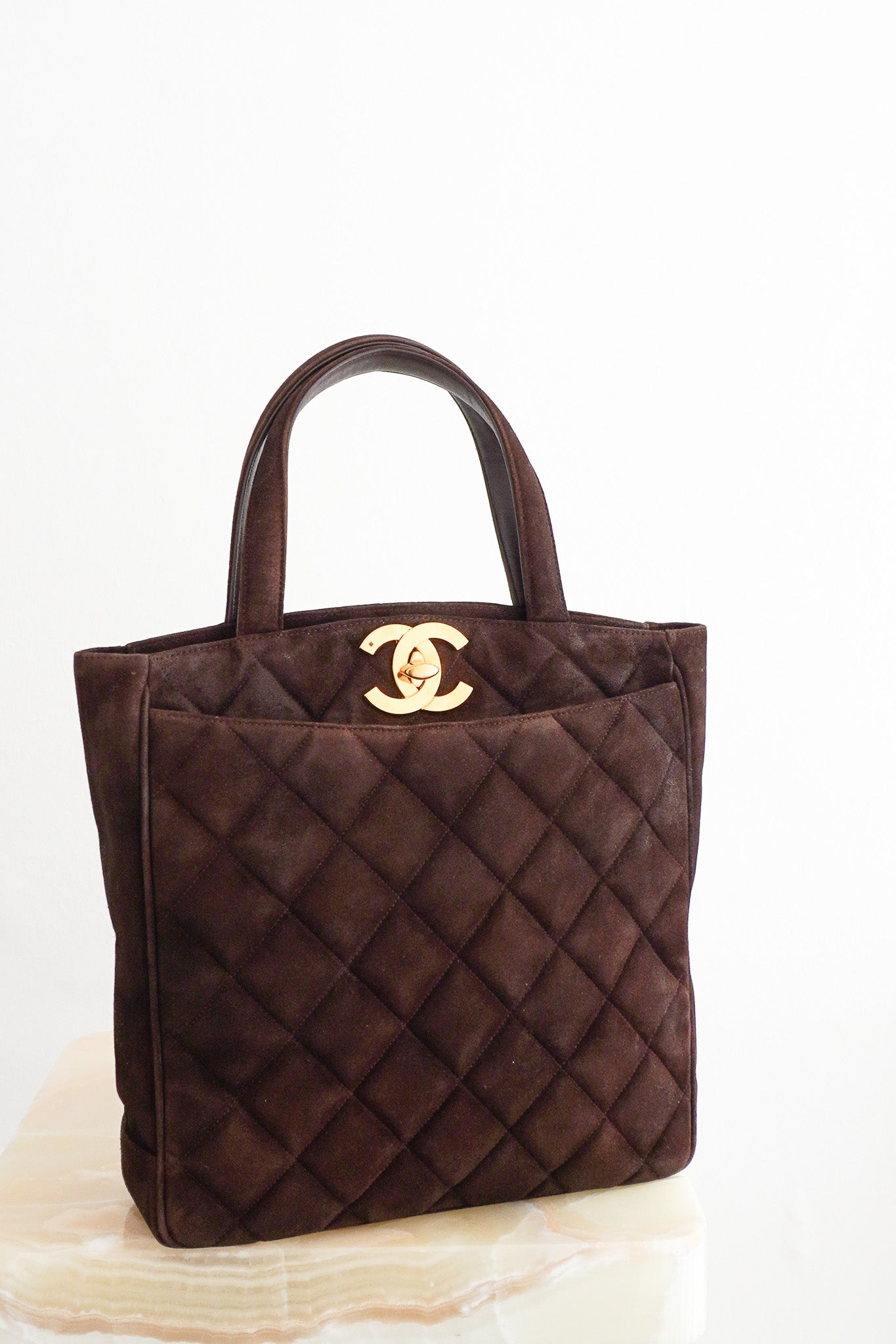 Front photos of the Chanel Vintage Brown Quilted Suede CC Tote Bag Chelsea London