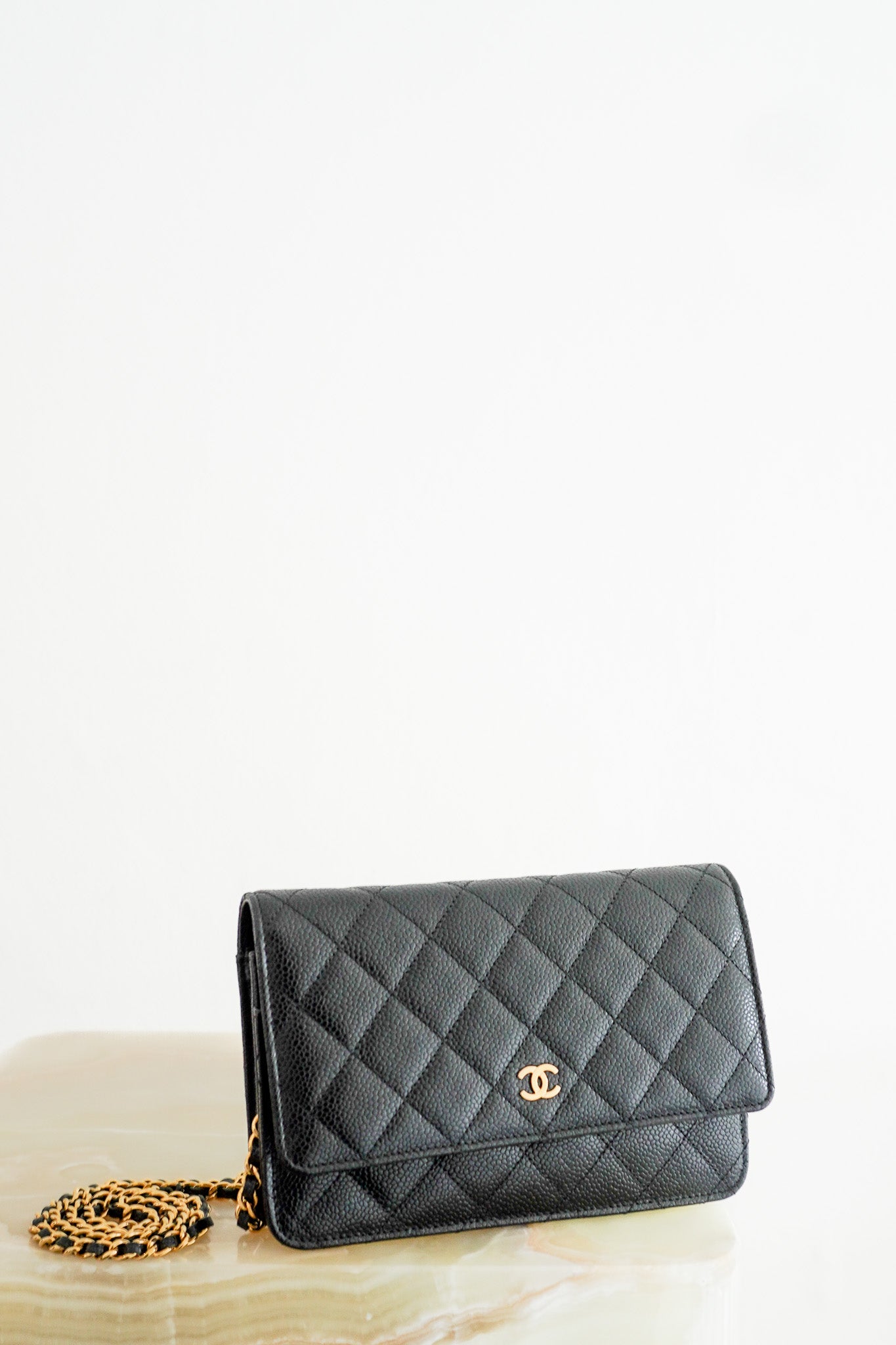 Front picture of the Chanel Wallet on Chain Black Caviar Leather & Gold Hardware Chelsea London