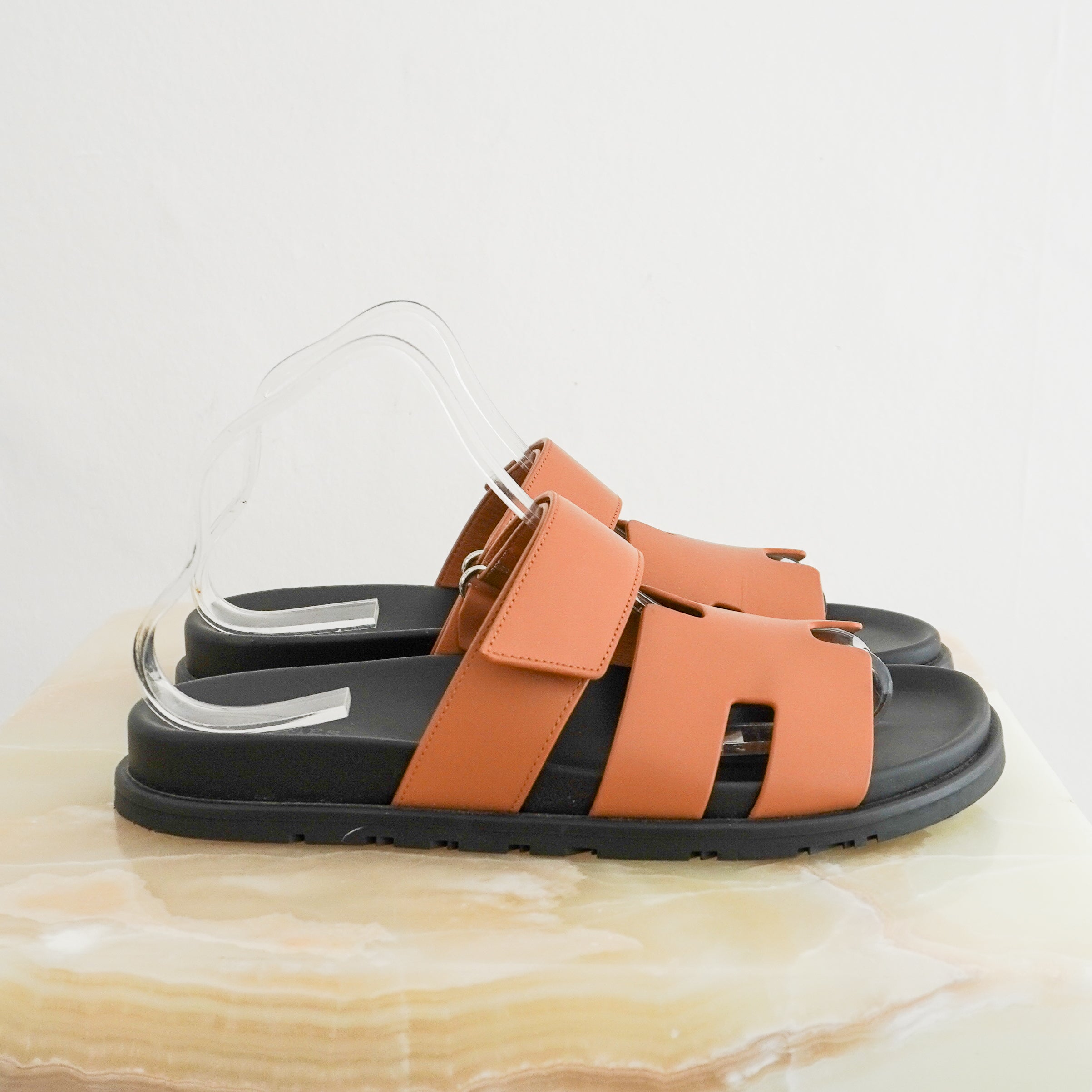 Hermès Brown Leather Chypre Sandals side photo chelsea london