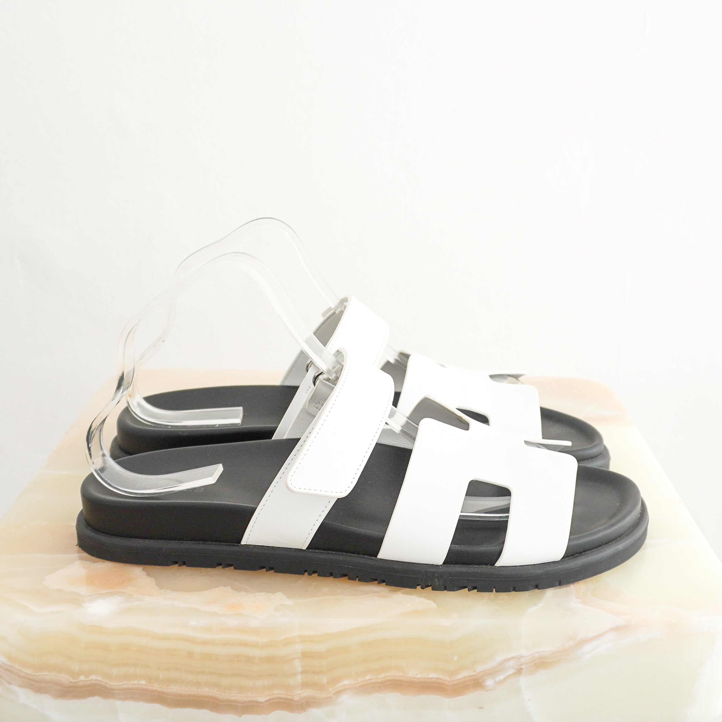 Hermès Chypre Sandals in Blanc Calfskin Leather side photo chelsea london