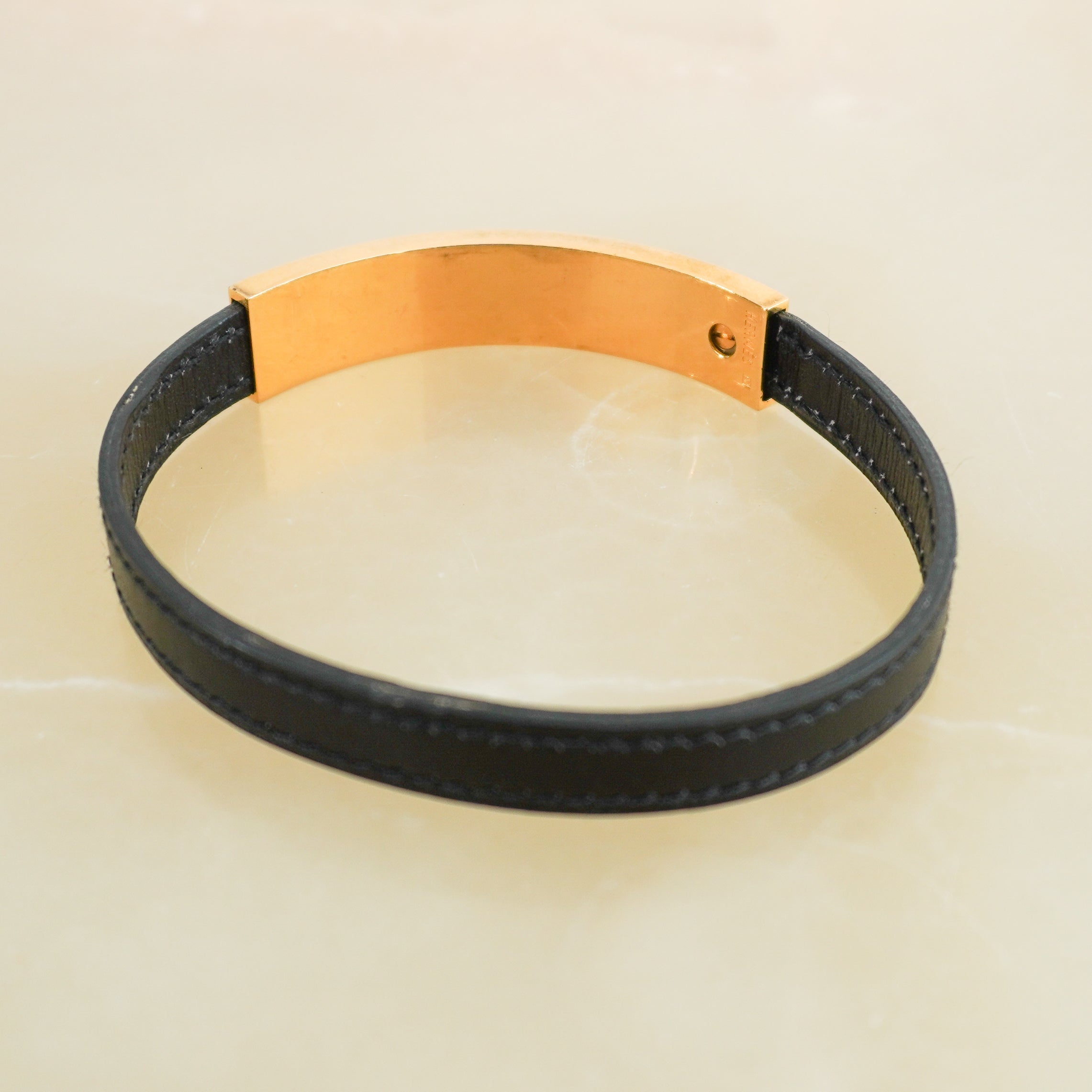 Hermès Coulis Bracelet in Black Leather with Gold-Tone Hardware back photo chelsea london