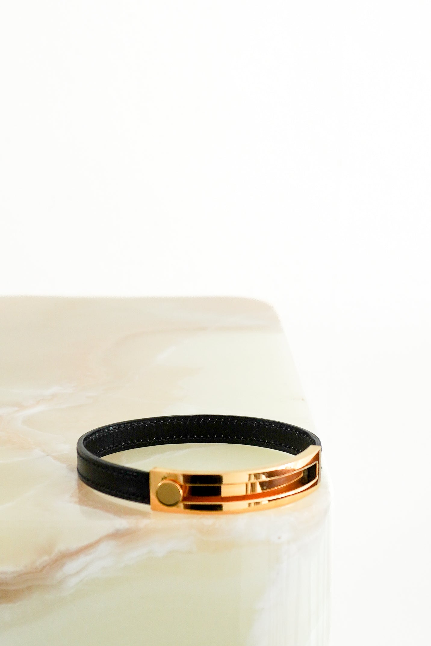 Hermès Coulis Bracelet in Black Leather with Gold-Tone Hardware front photo chelsea london