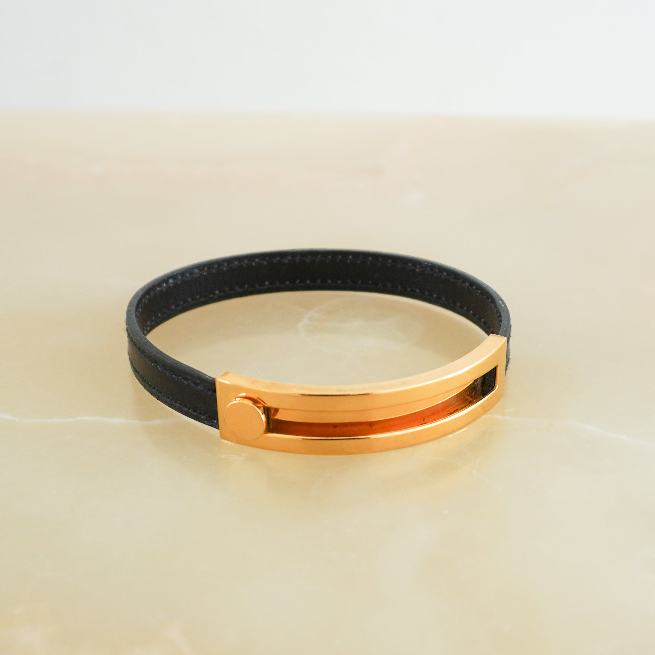 Hermès Coulis Bracelet in Black Leather with Gold-Tone Hardware front photo chelsea london main