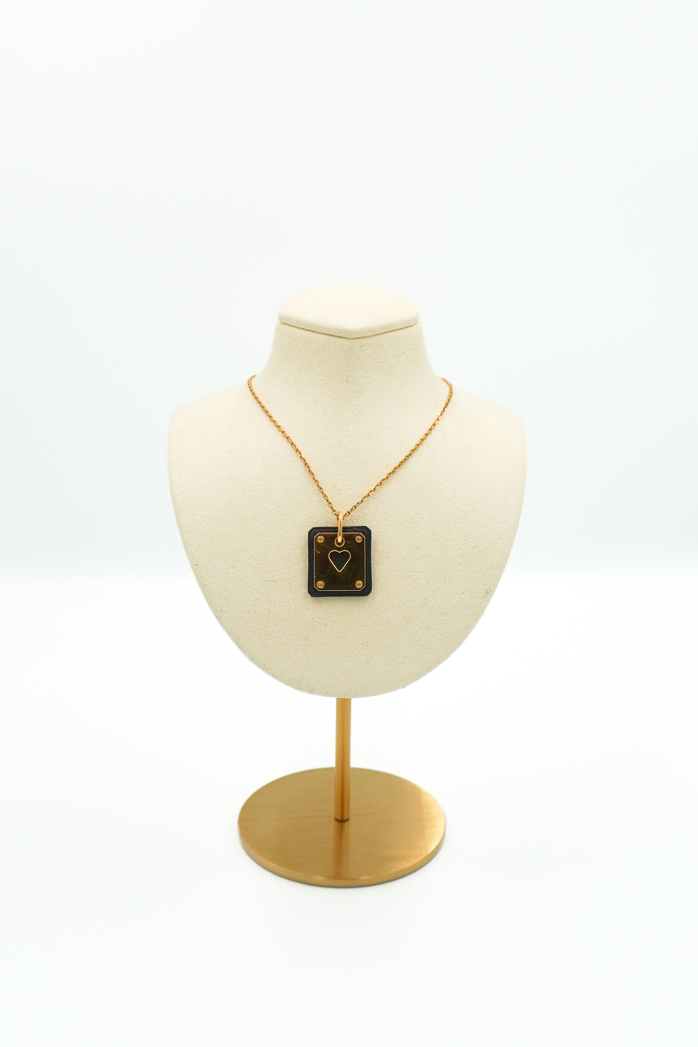 Hermès Pendentif Cuir As de Coeur PM Necklace in Noir front photo chelsea london