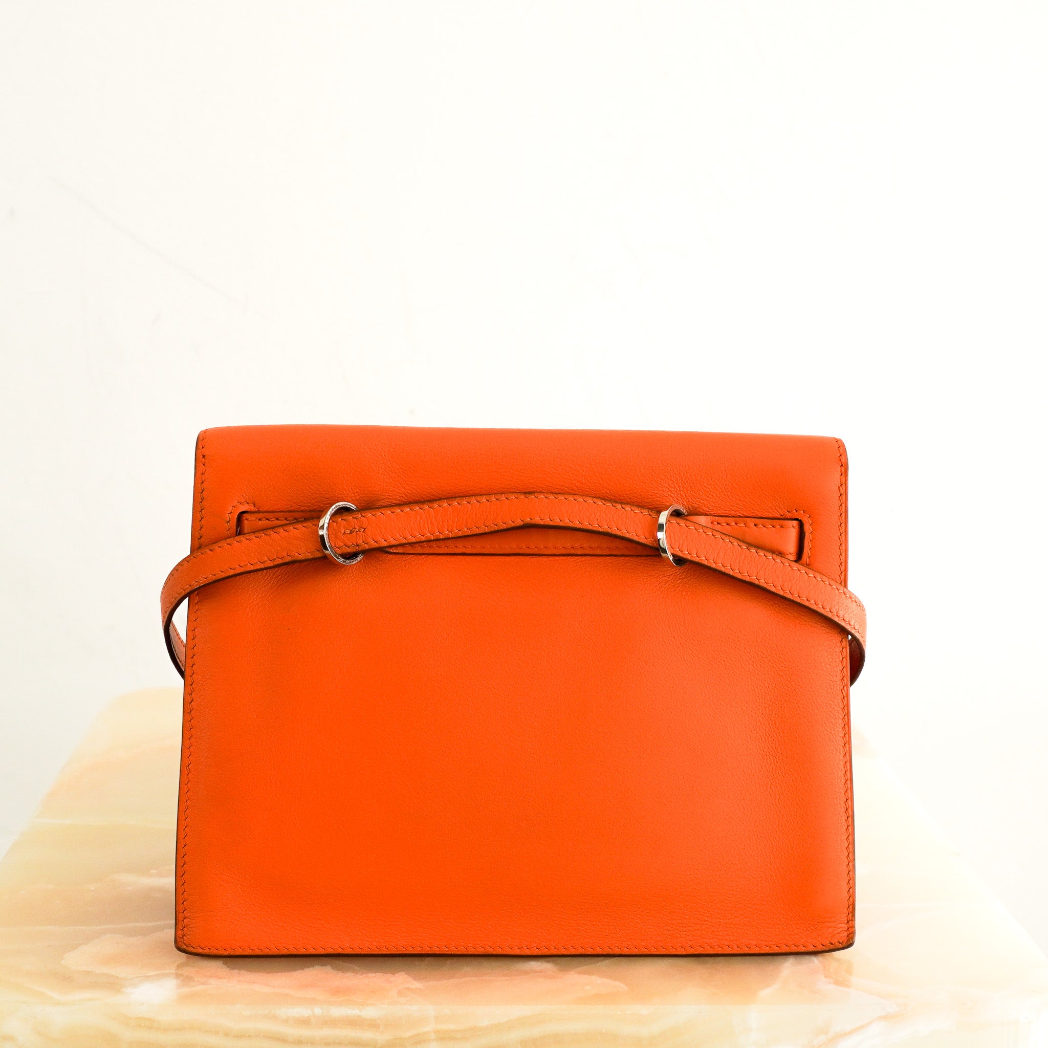 Hermès Kelly Danse II Orange in Swift Leather | Authentic Preloved - Reloved Again