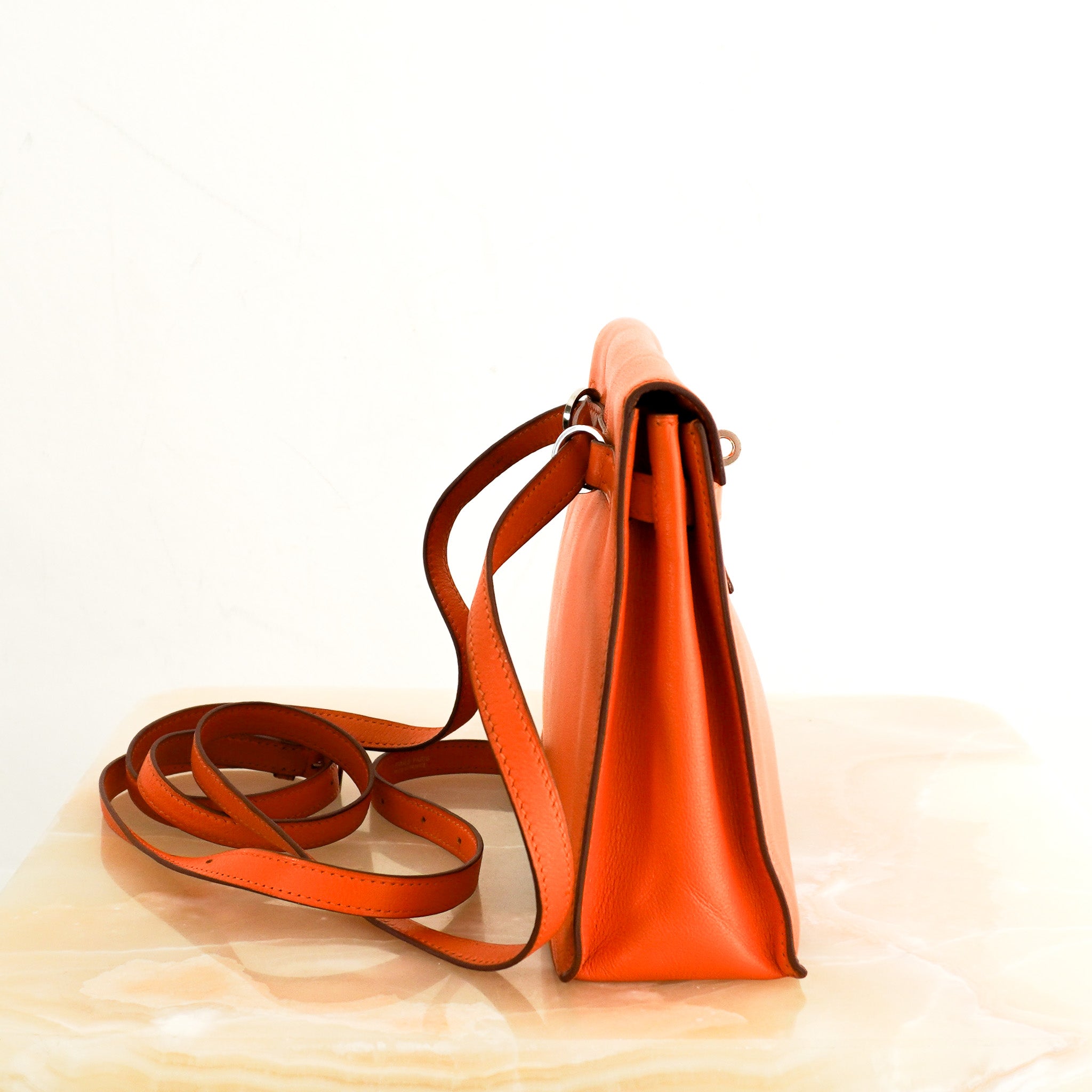 Hermès Kelly Danse II Orange in Swift Leather | Authentic Preloved - Reloved Again