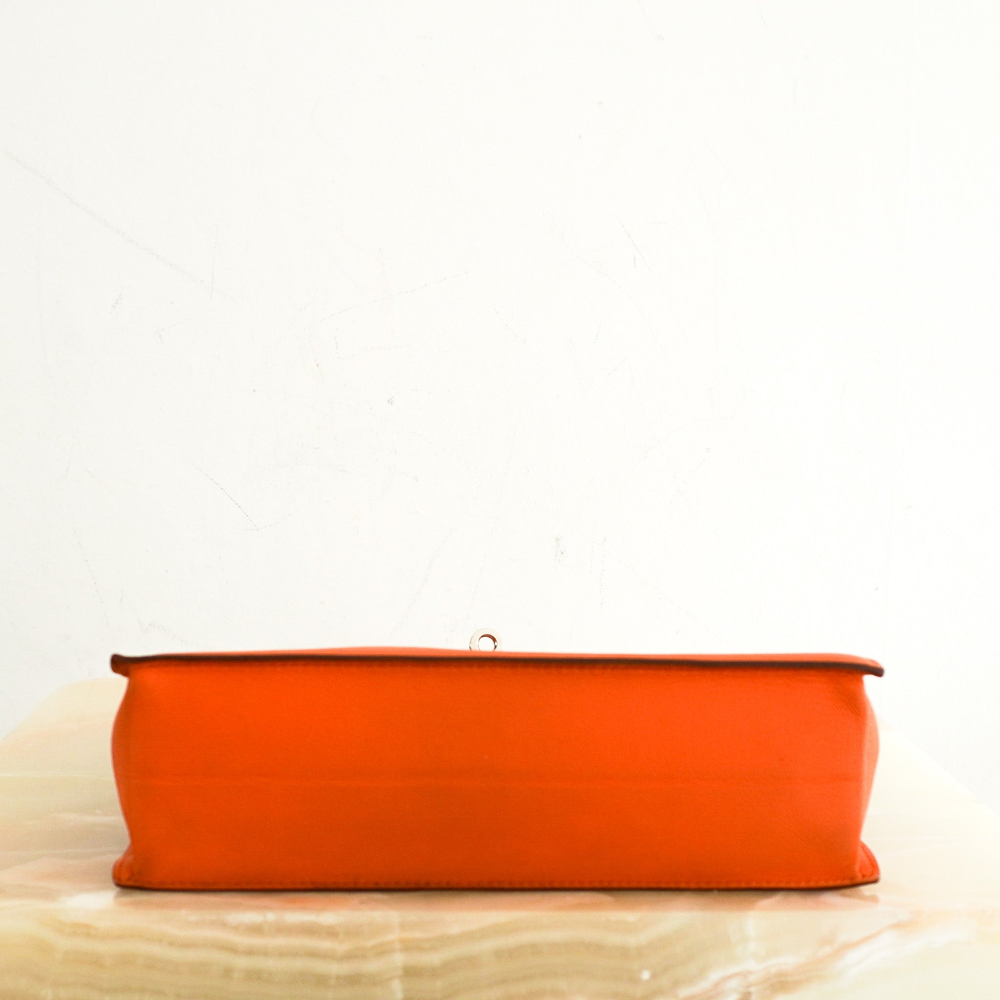 Hermès Kelly Danse II Orange in Swift Leather | Authentic Preloved - Reloved Again