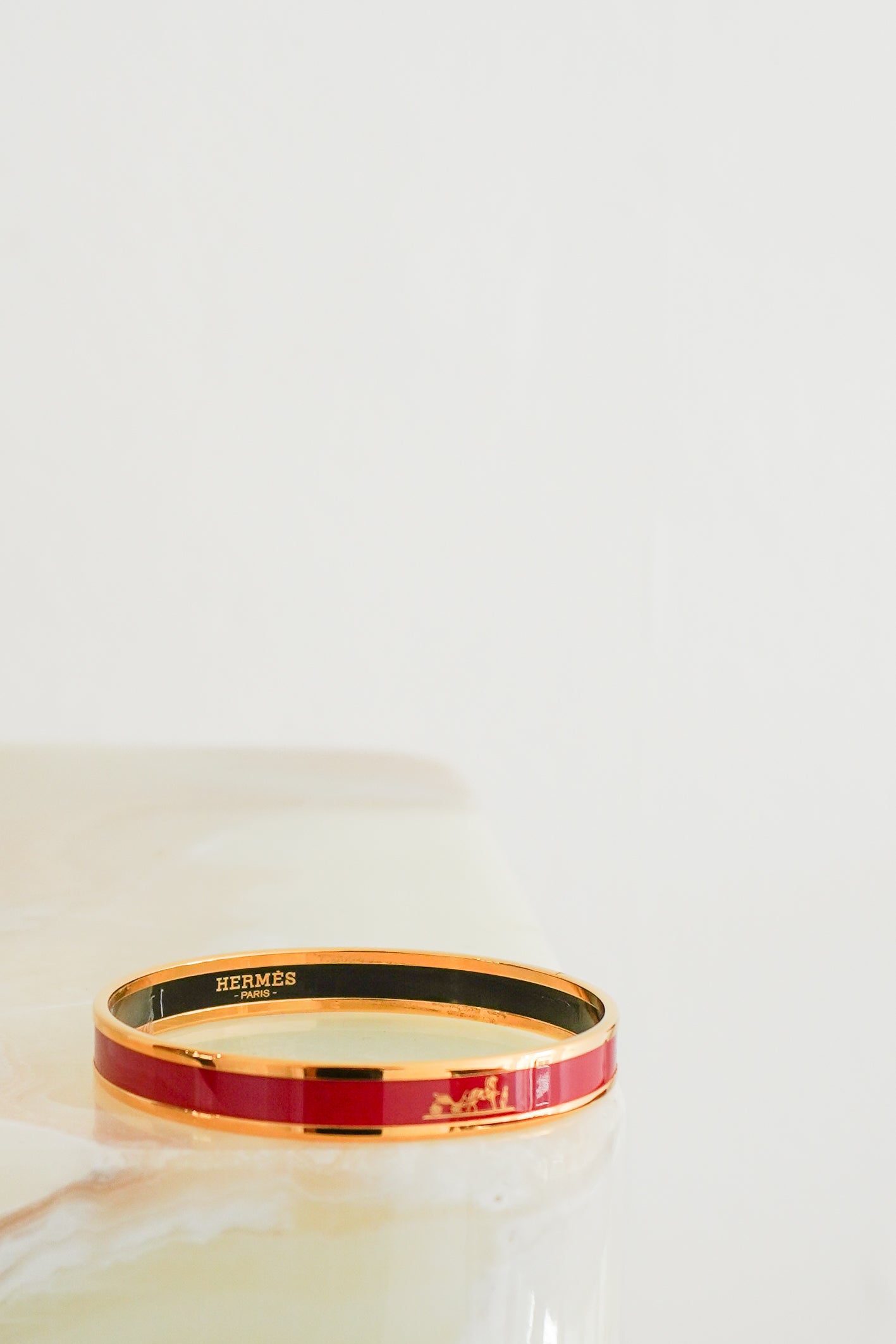 Hermes Red Enamel Bracelet in Gold Plated Metal front photo chelsea london