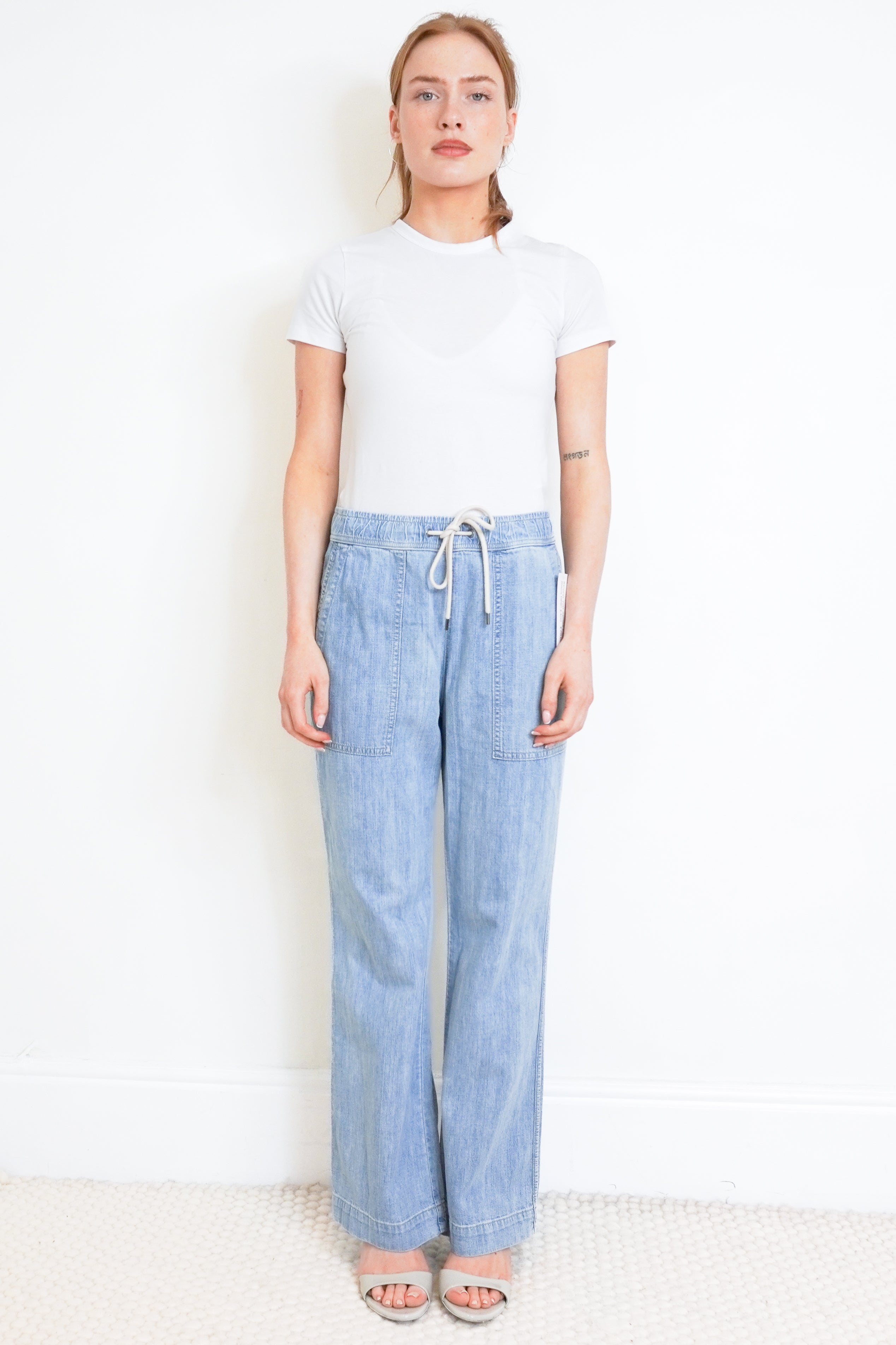 James Perse Light Wash Drawstring Denim Trousers front photo chelsea london