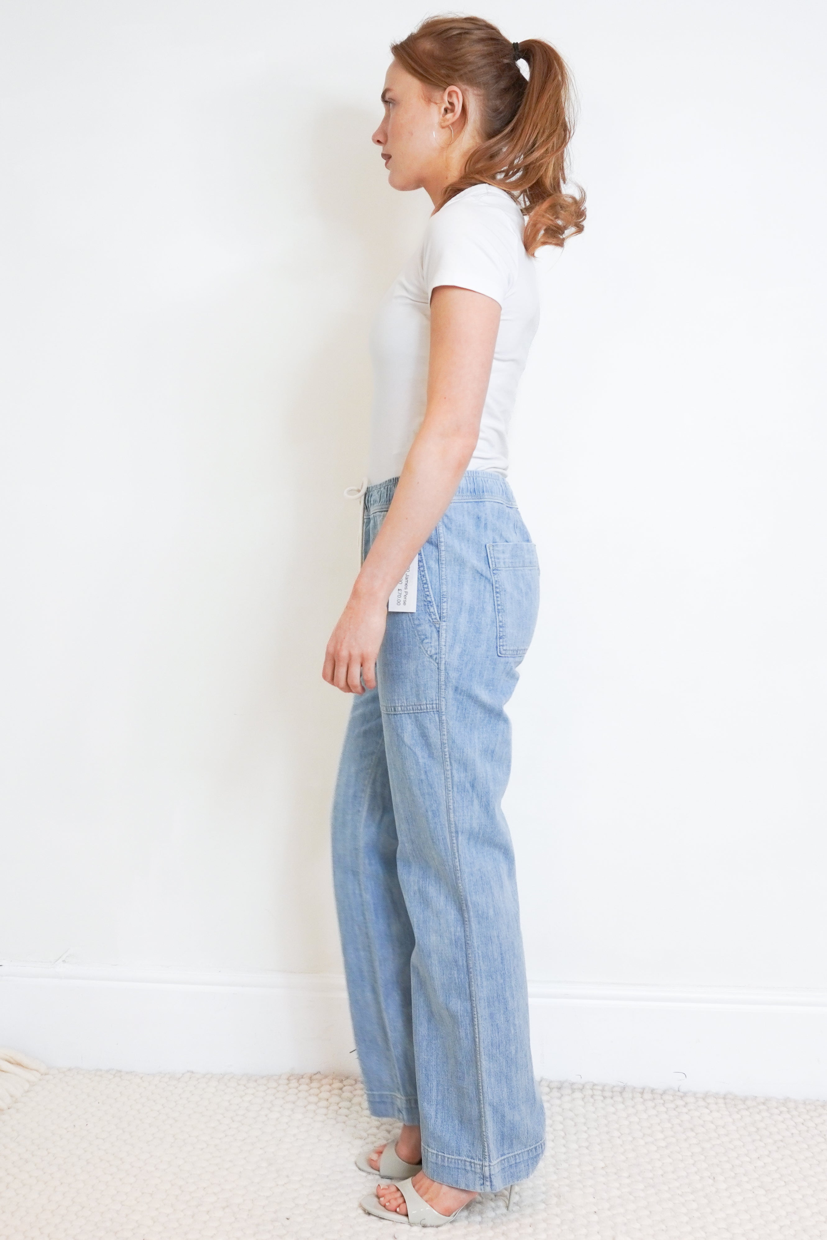 James Perse Light Wash Drawstring Denim Trousers side photo chelsea london