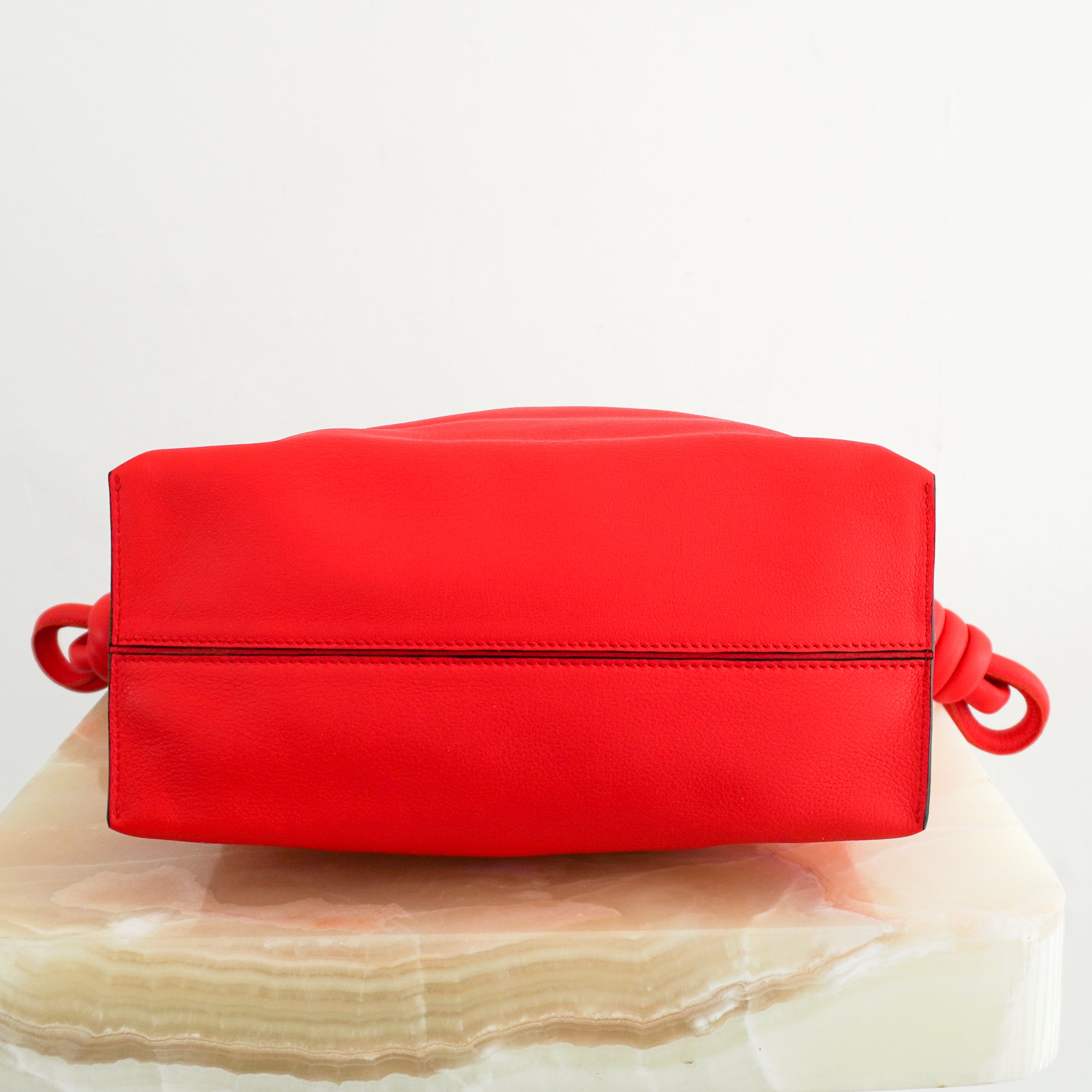 LOEWE Flamenco Knot Tote Bag in Primary Red bottom photo chelsea london