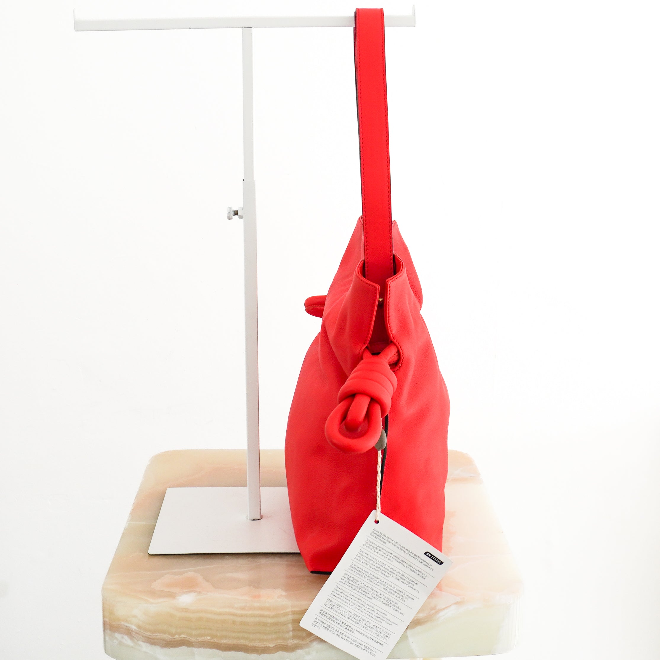 LOEWE Flamenco Knot Tote Bag in Primary Red side photo chelsea london