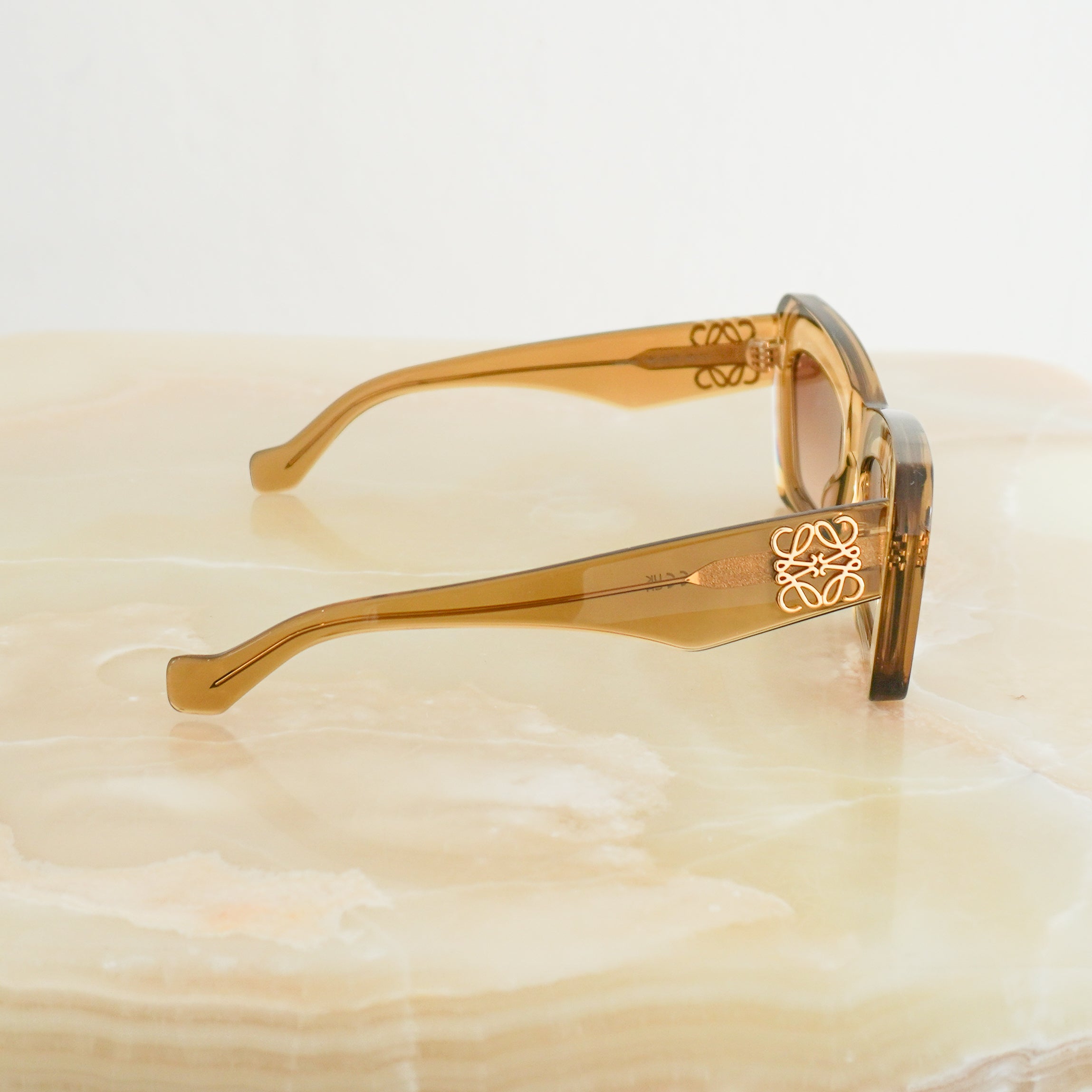 Loewe Anagram LW40145I 96F Brown Translucent Cat-Eye Sunglasses side photo chelsea london