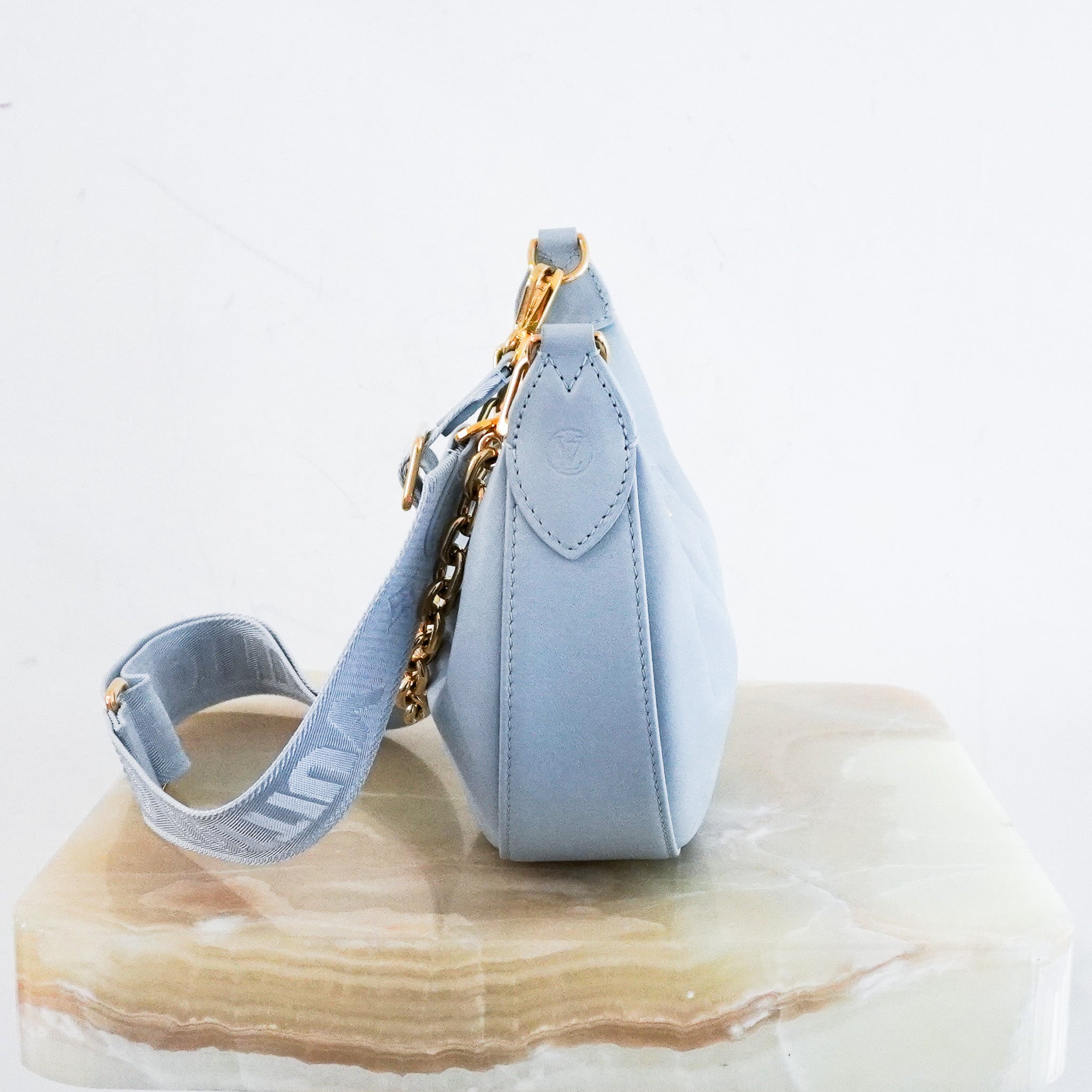 Louis-Vuitton-Over-The-Moon-Bag-in-Blue-side-picture