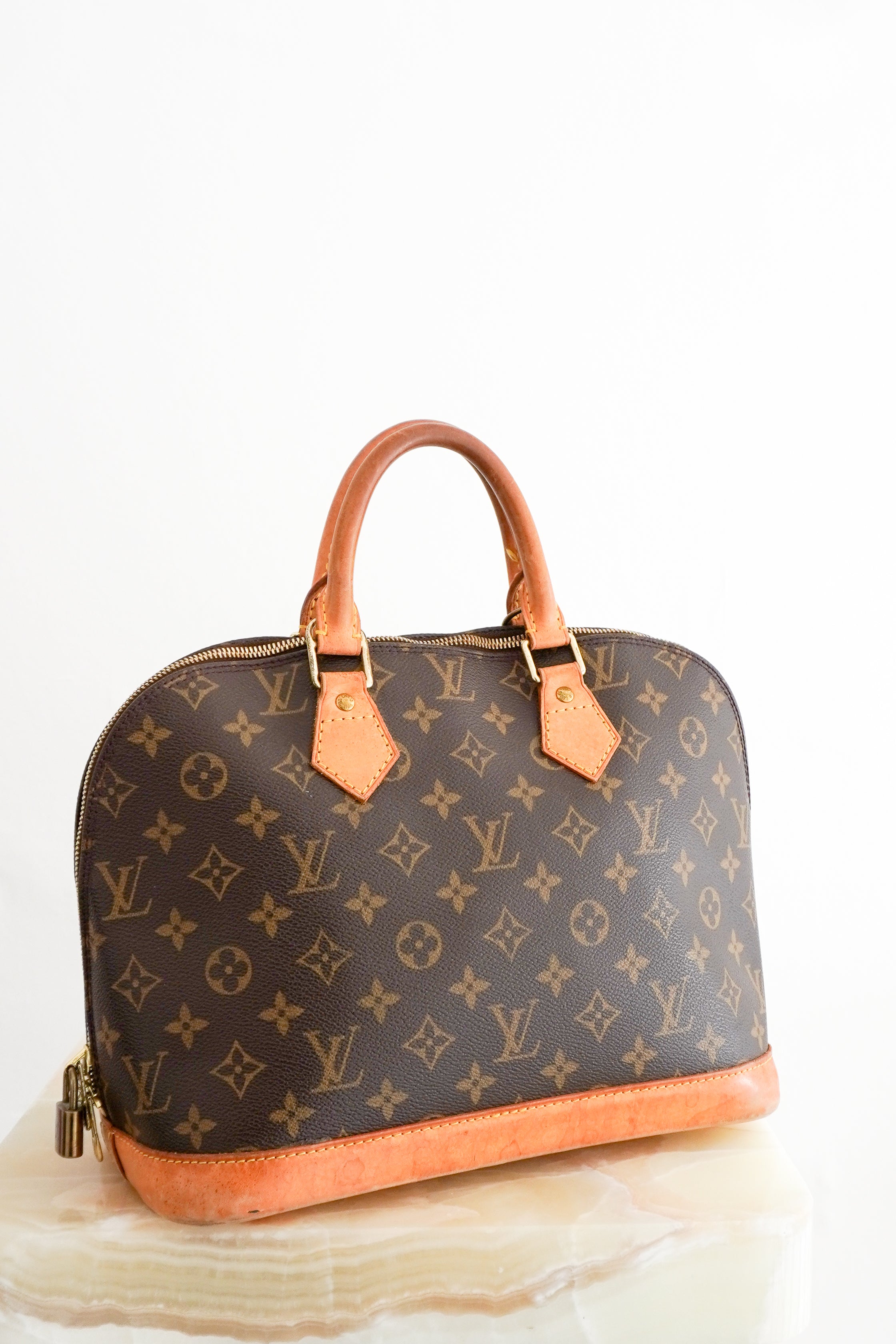 Louis Vuitton Alma PM Monogram Canvas Bag front photo chelsea london