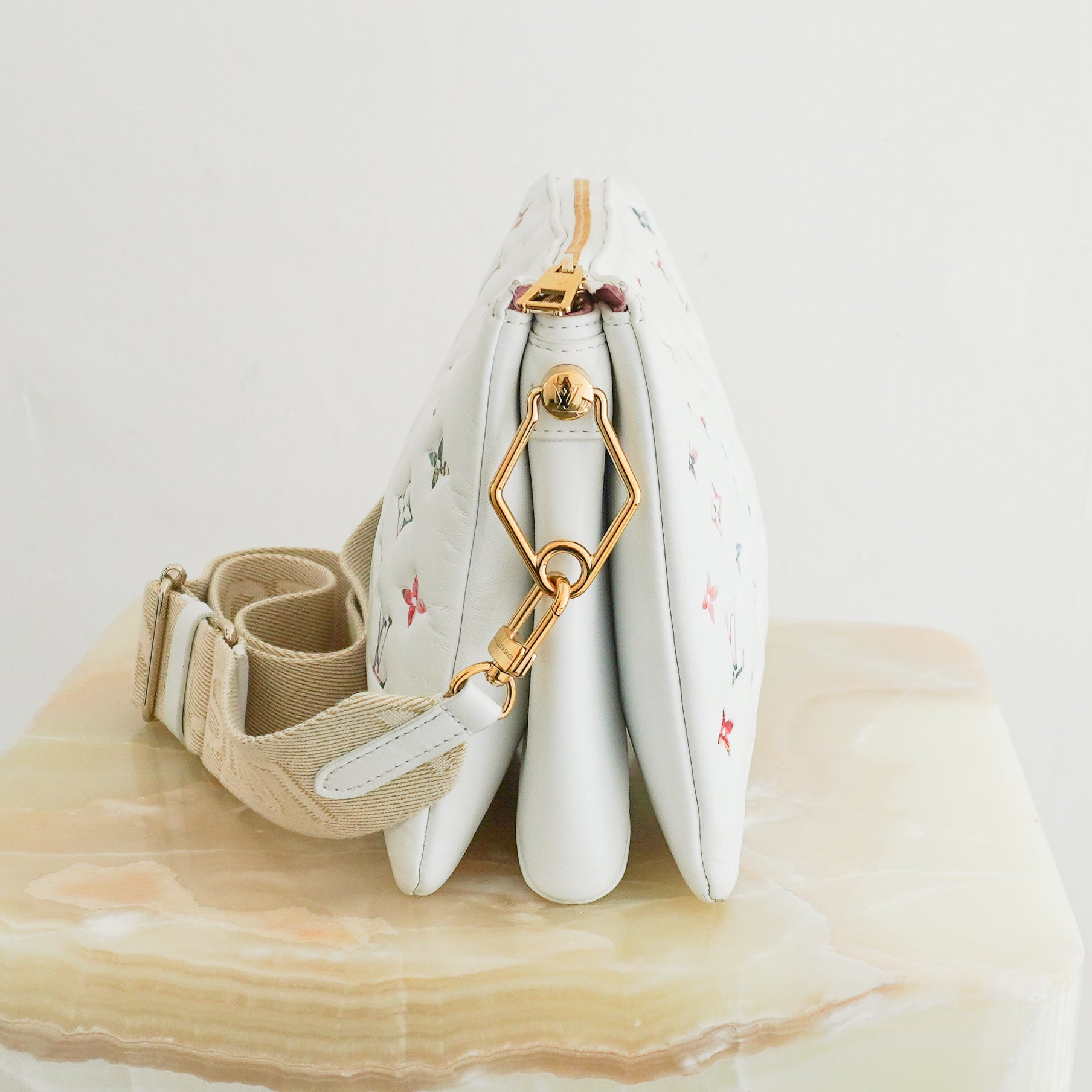 Louis Vuitton Coussin PM Monogram Floral White Leather Bag side photo chelsea london