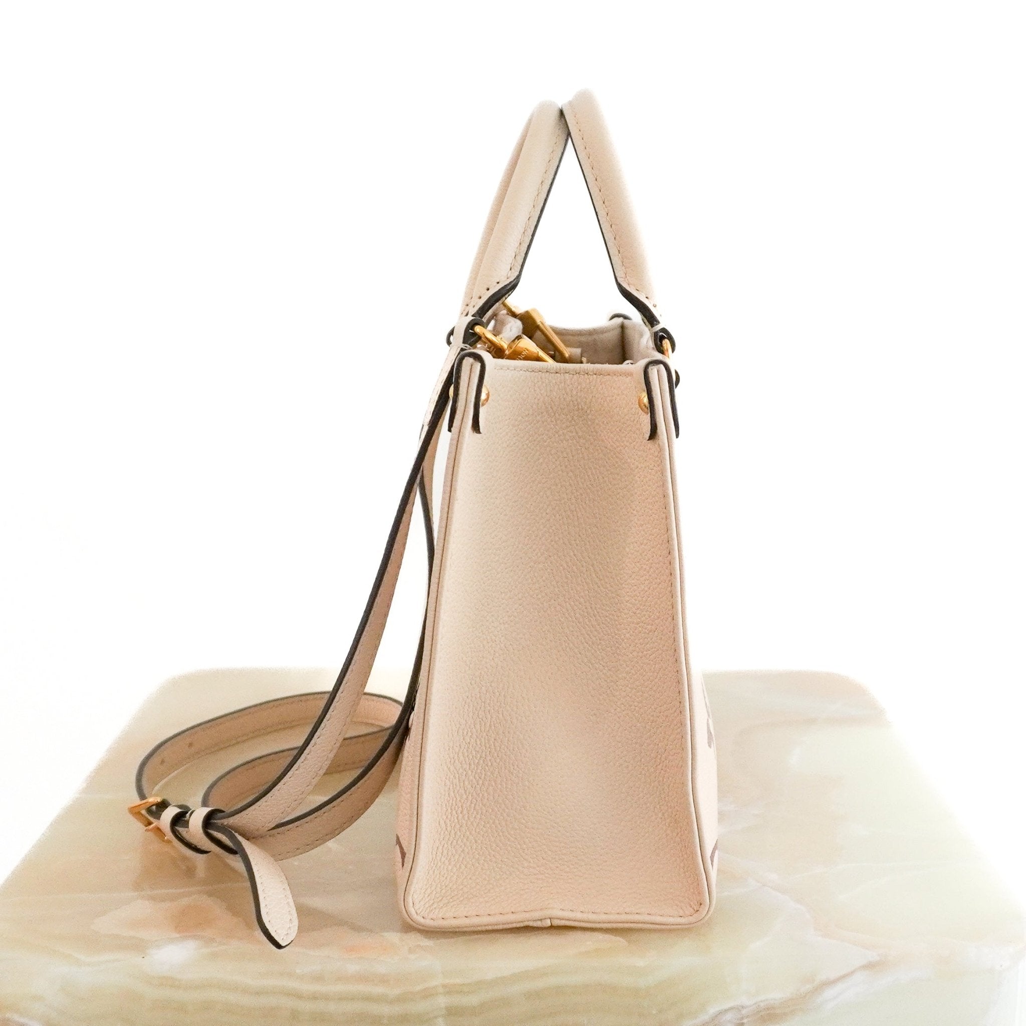 Louis Vuitton OnTheGo PM Bag in White Monogram Empreinte Leather (RRP £2750) | Authentic Preloved - Reloved Again