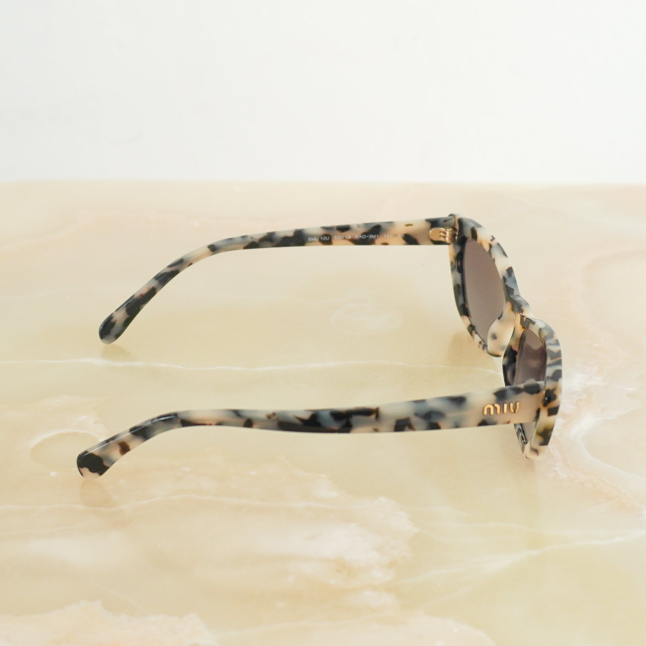 Miu Miu SMU 10U KAD-3M1 Tortoiseshell Cat Eye Sunglasses side photo chelsea london