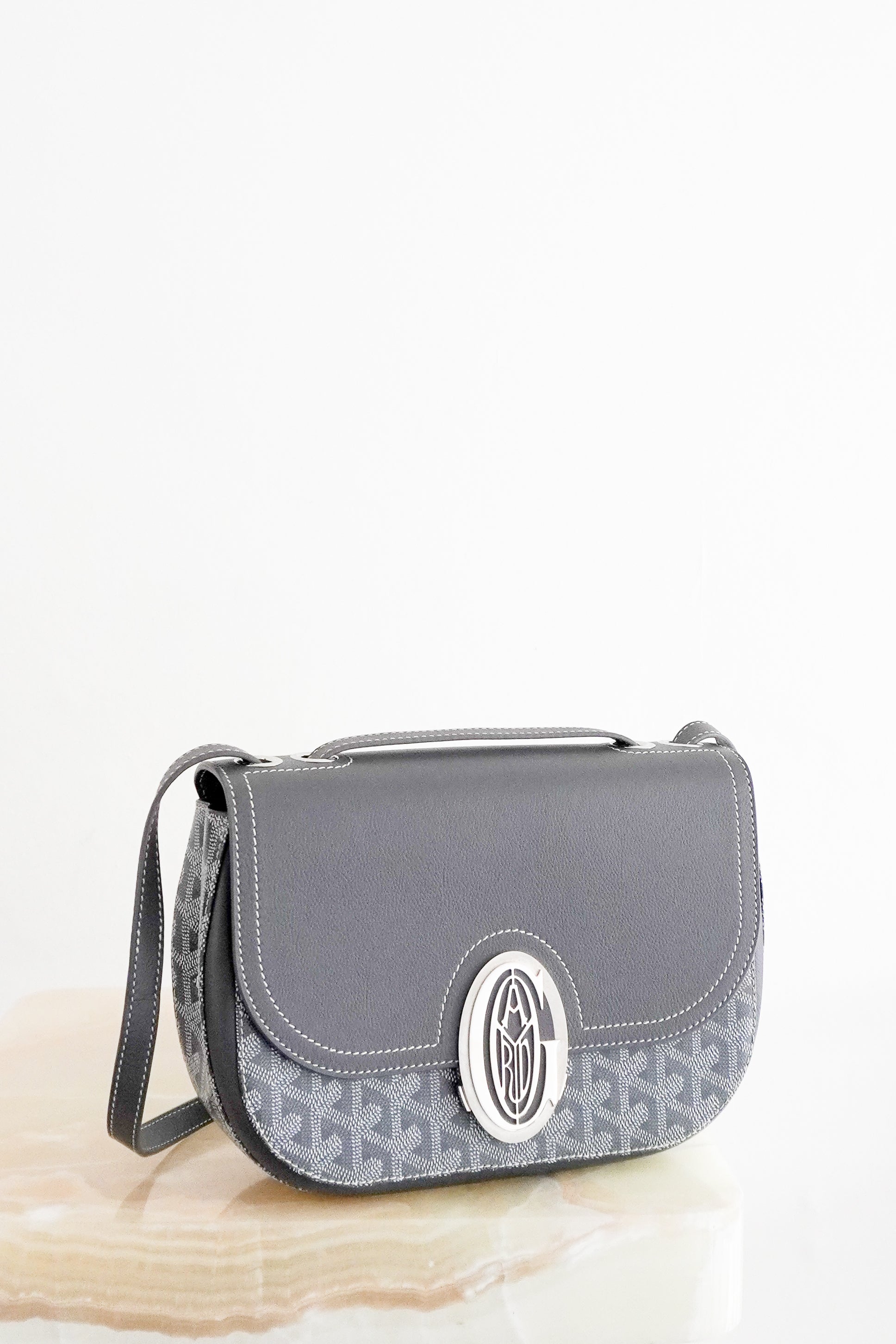 NEW Goyard 233 PM Bag in grey Goyardine canvas with grey Taurillon leather trim and palladium-tone hardware.