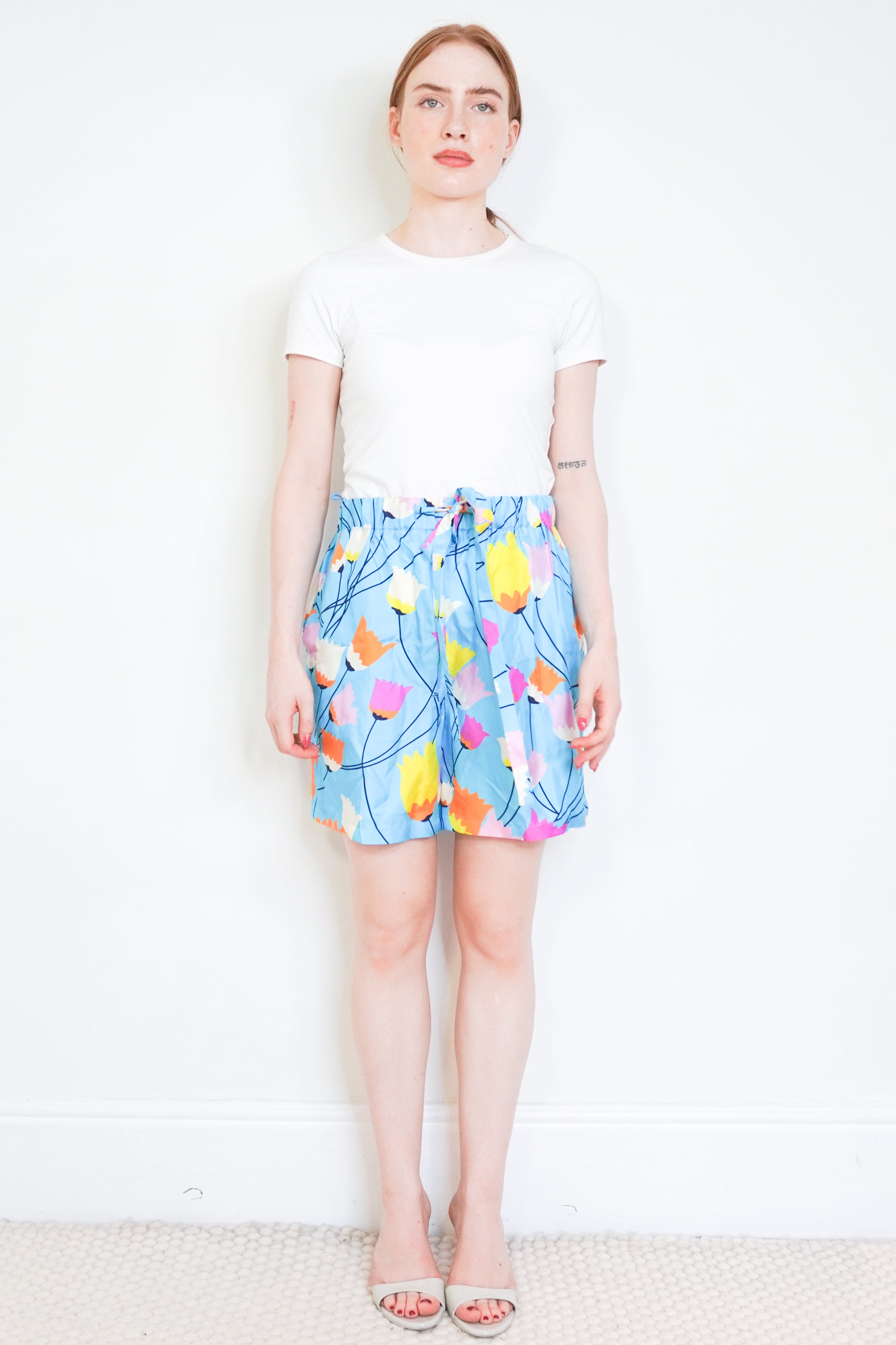 NEW Gucci Blue Floral Print Silk Drawstring Shorts front photo chelsea london