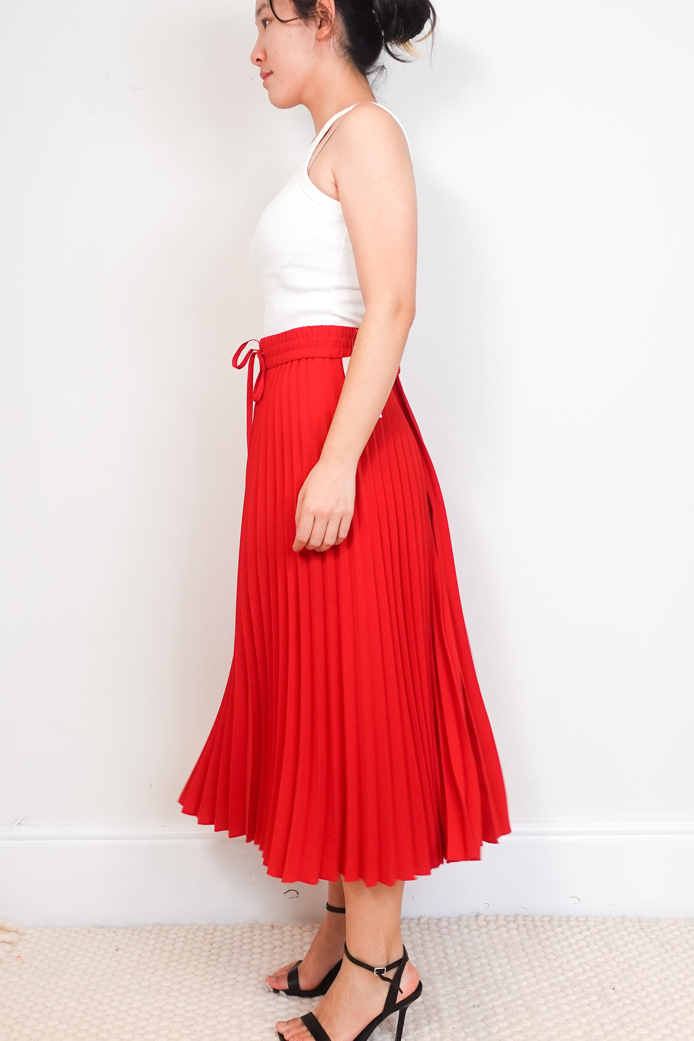Red-Valentino-accordion-skirt-side-picture-Chelsea-London
