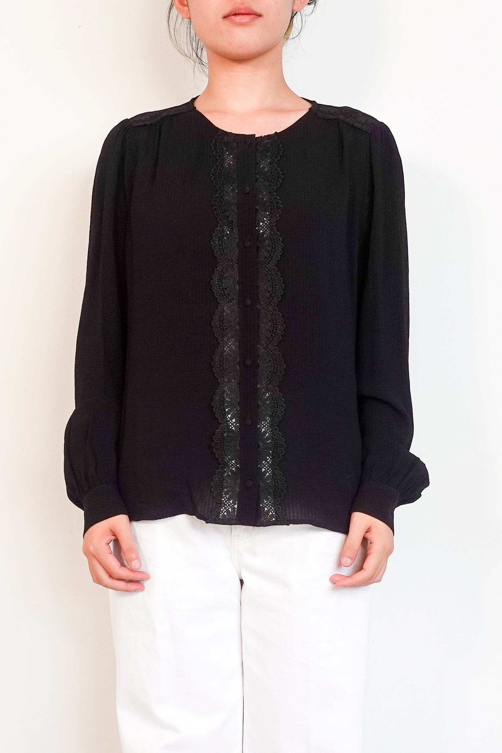 Sézane-black-blouse-with-woven-fan-detailing-front-picture