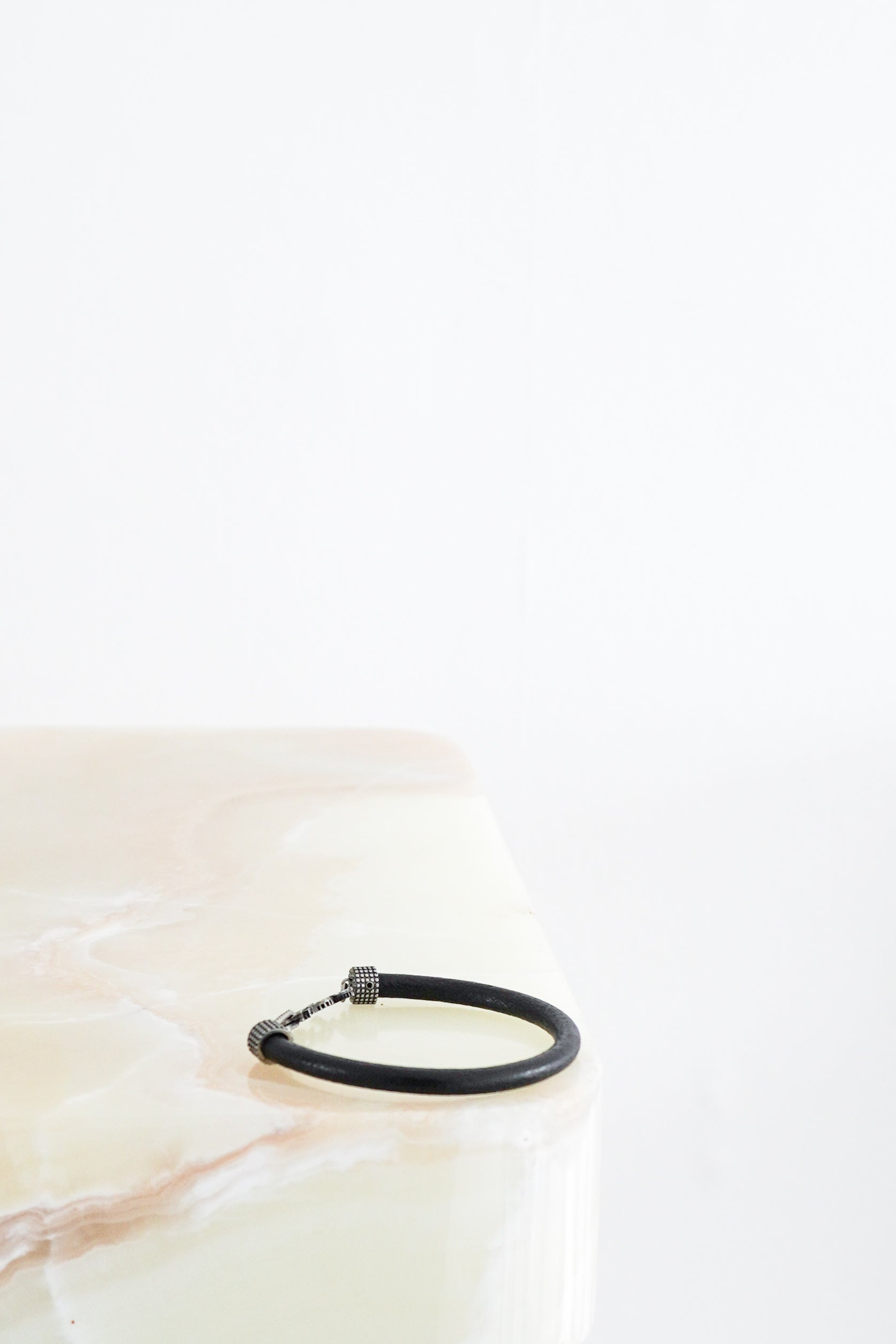 Saint-Laurent-Black-Leather-YSL-Bracelet-front-picture-Chelsea-London