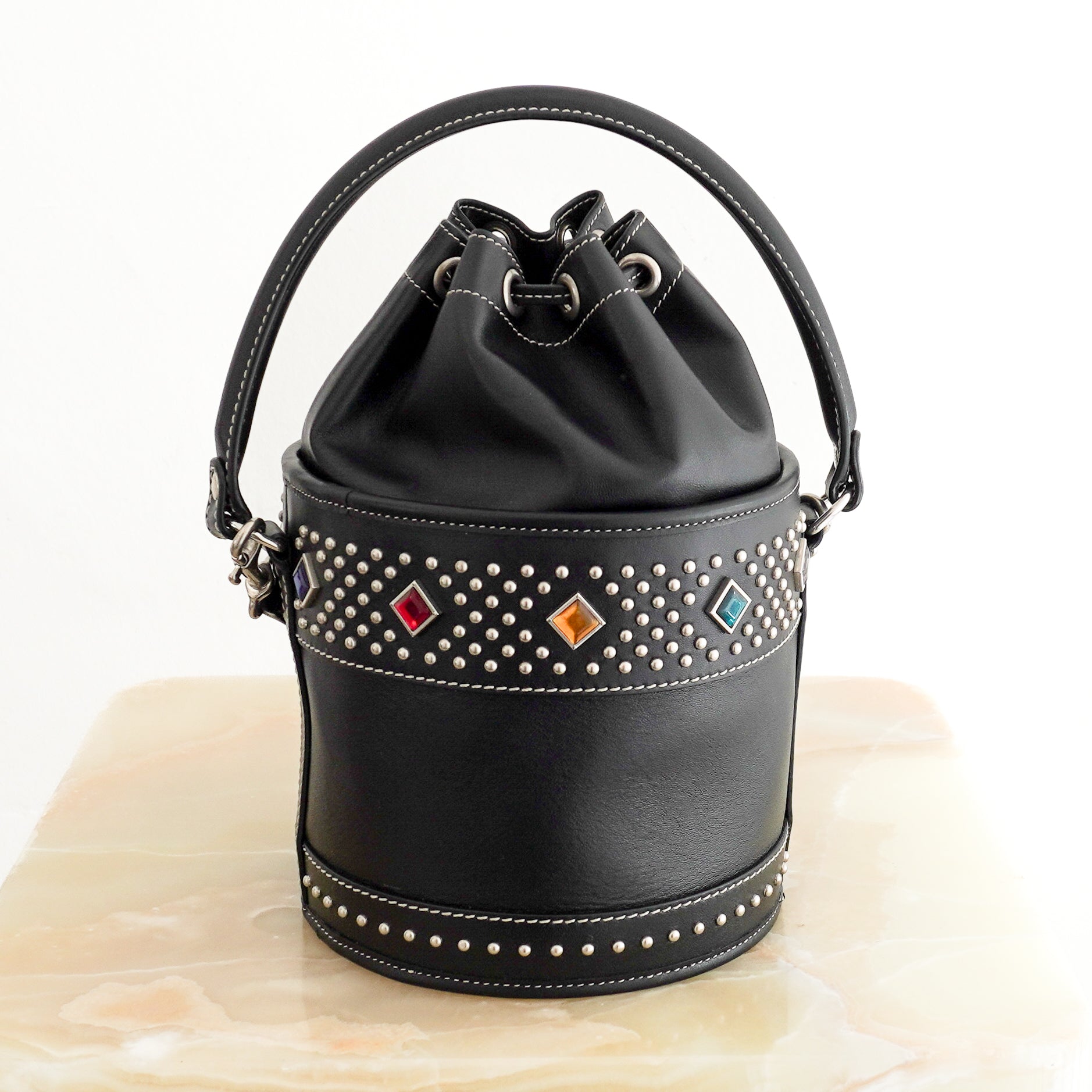 Saint Laurent Bahia Small Embellished Leather Bucket Bag in Black back photo chelsea london