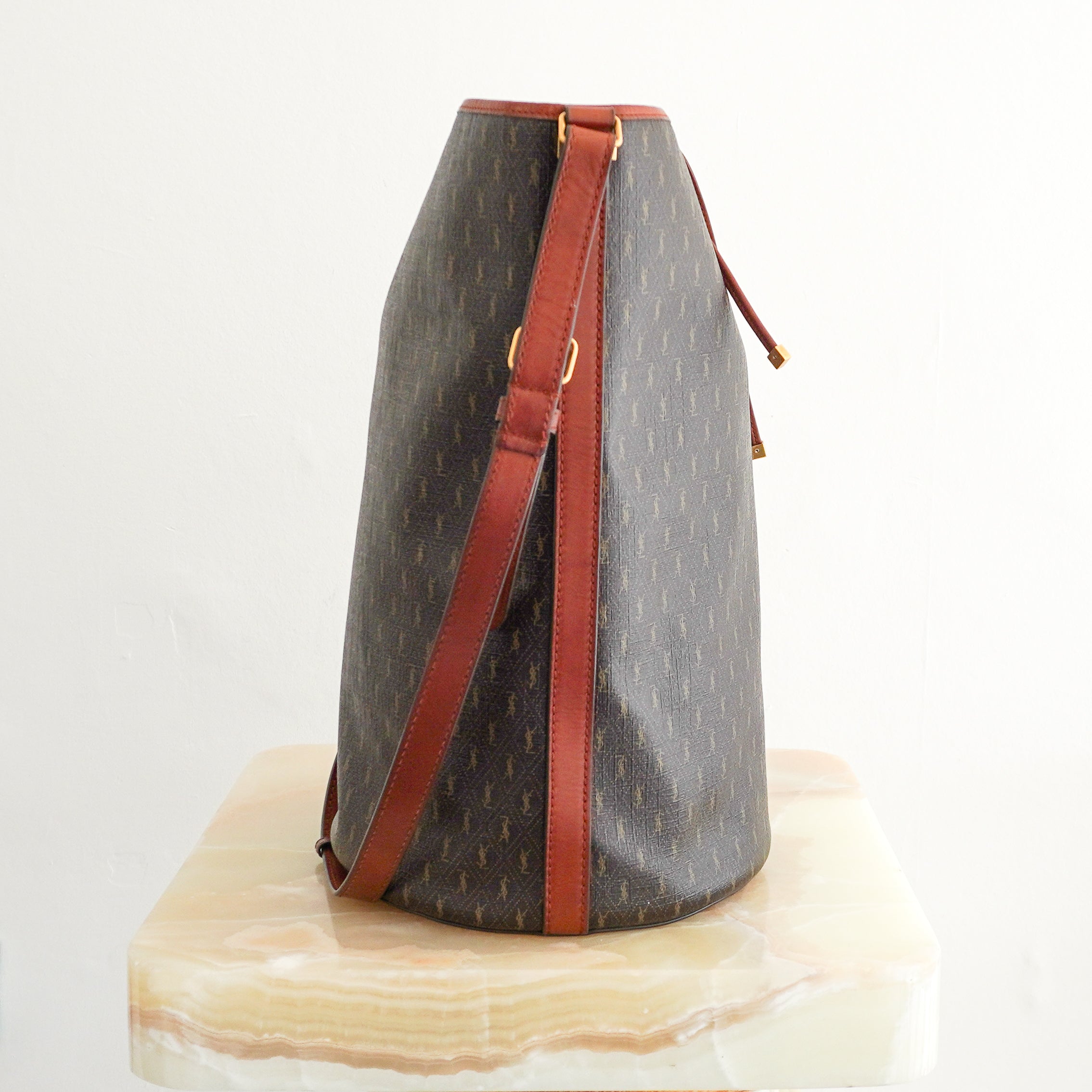 Saint Laurent Le Monogramme Bucket Bag in Brown Canvas side photo chelsea london