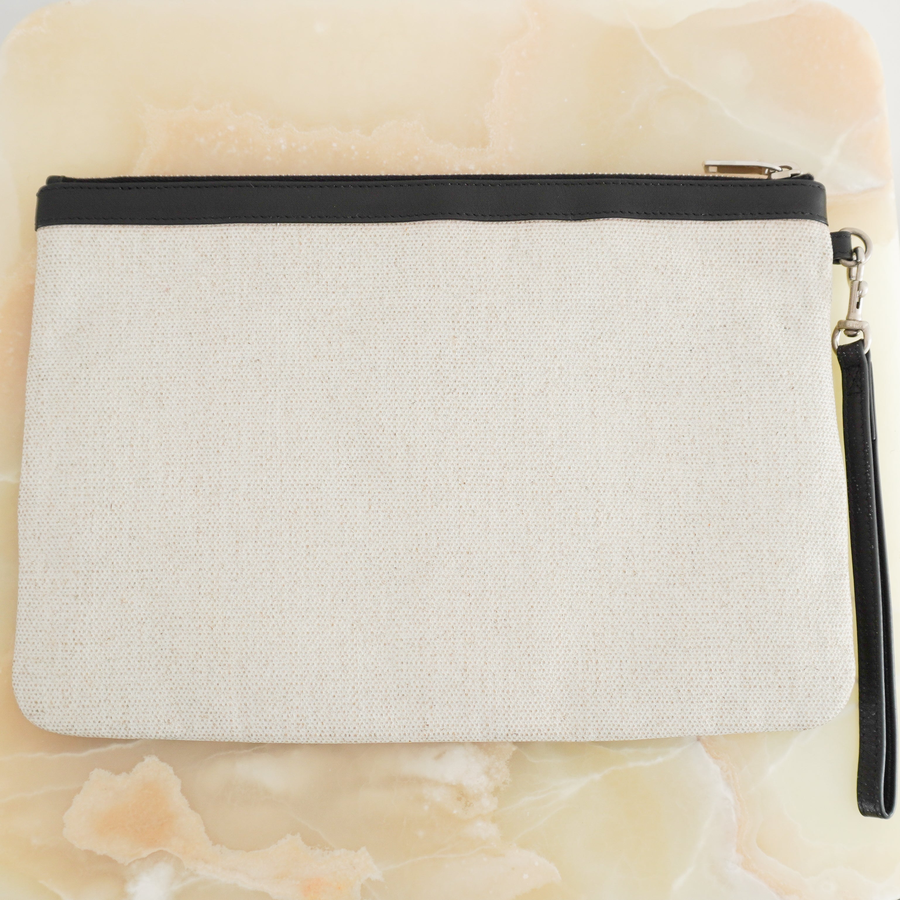 Saint Laurent Rive Gauche Zipped Pouch in Natural and Black front photo chelsea london back