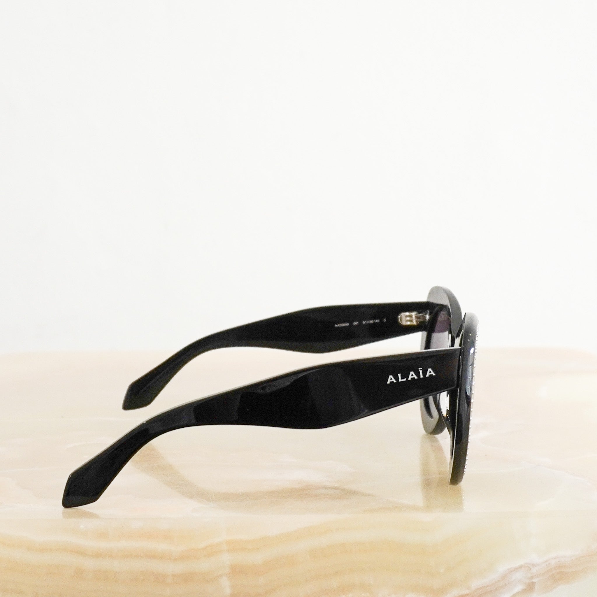 Side image Alaïa Black Round Acetate Sunglasses with Stud Detail 