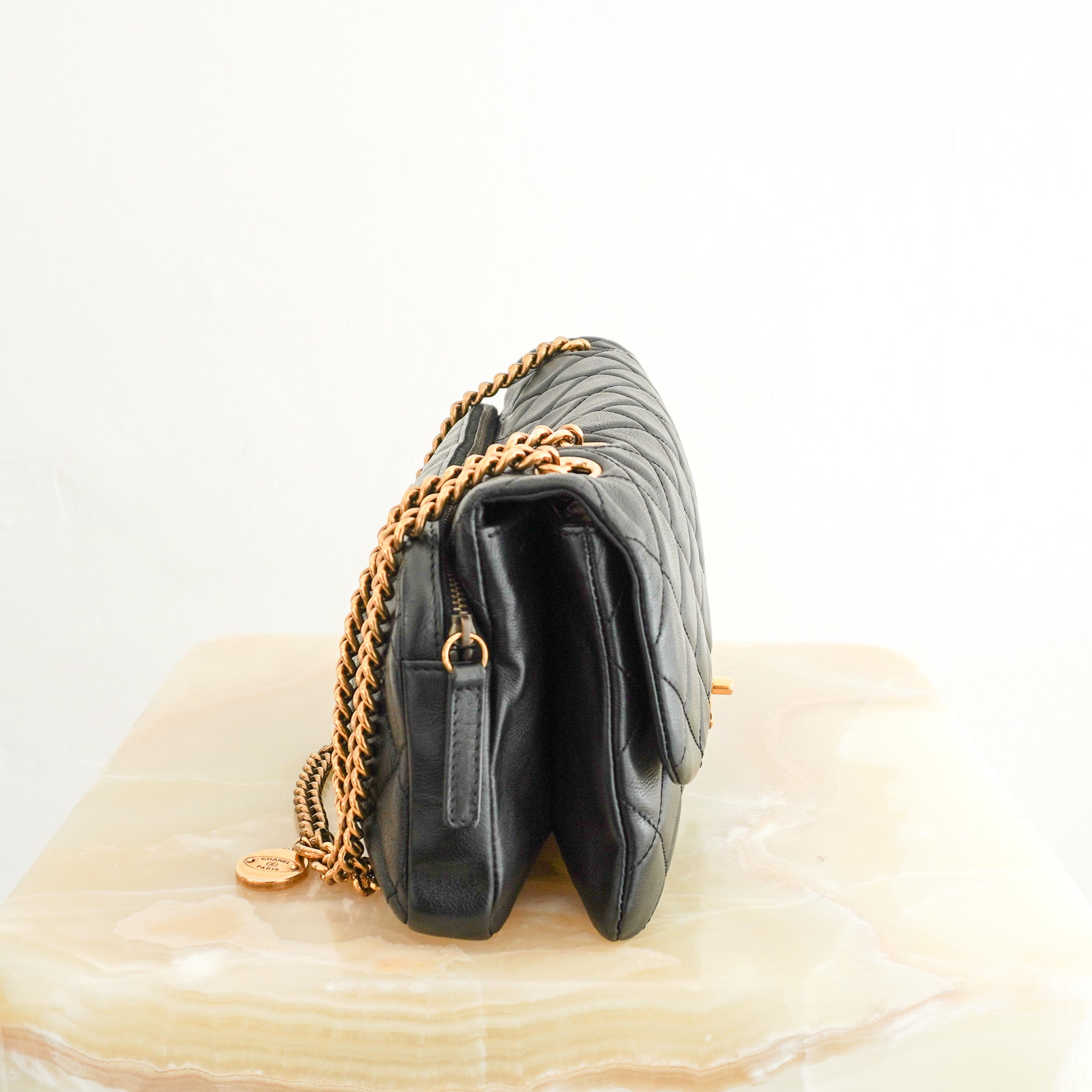 Side image of the Chanel Double Flap Shoulder Bag with Gold Hardware