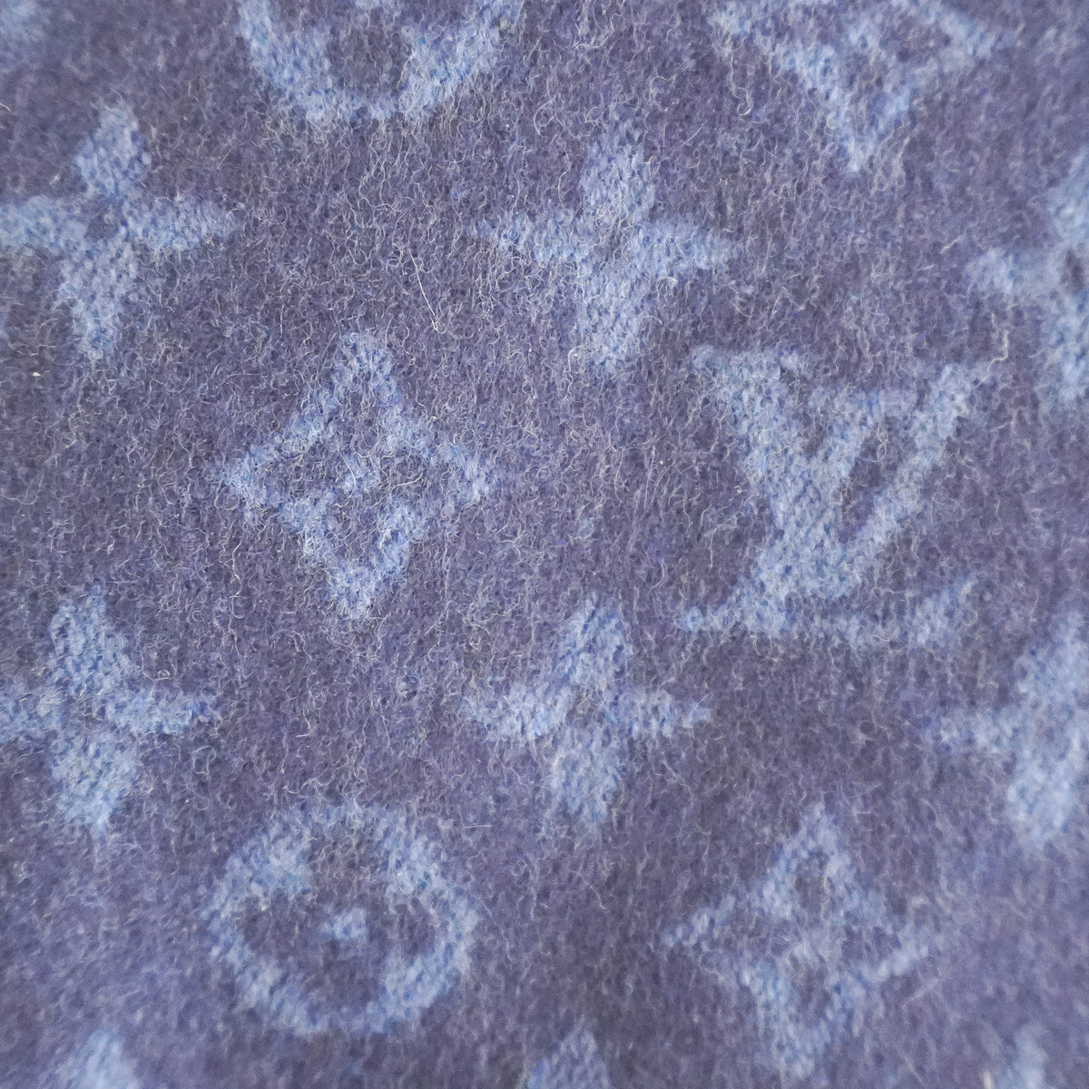 Side image of the Louis Vuitton Monogram Navy Wool Scarf Front image of the Louis Vuitton Monogram Navy Wool Scarf 