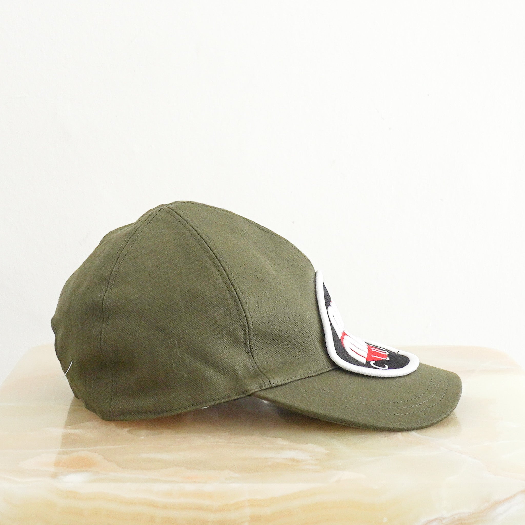Side image of the Miu Miu Cap in Khaki 