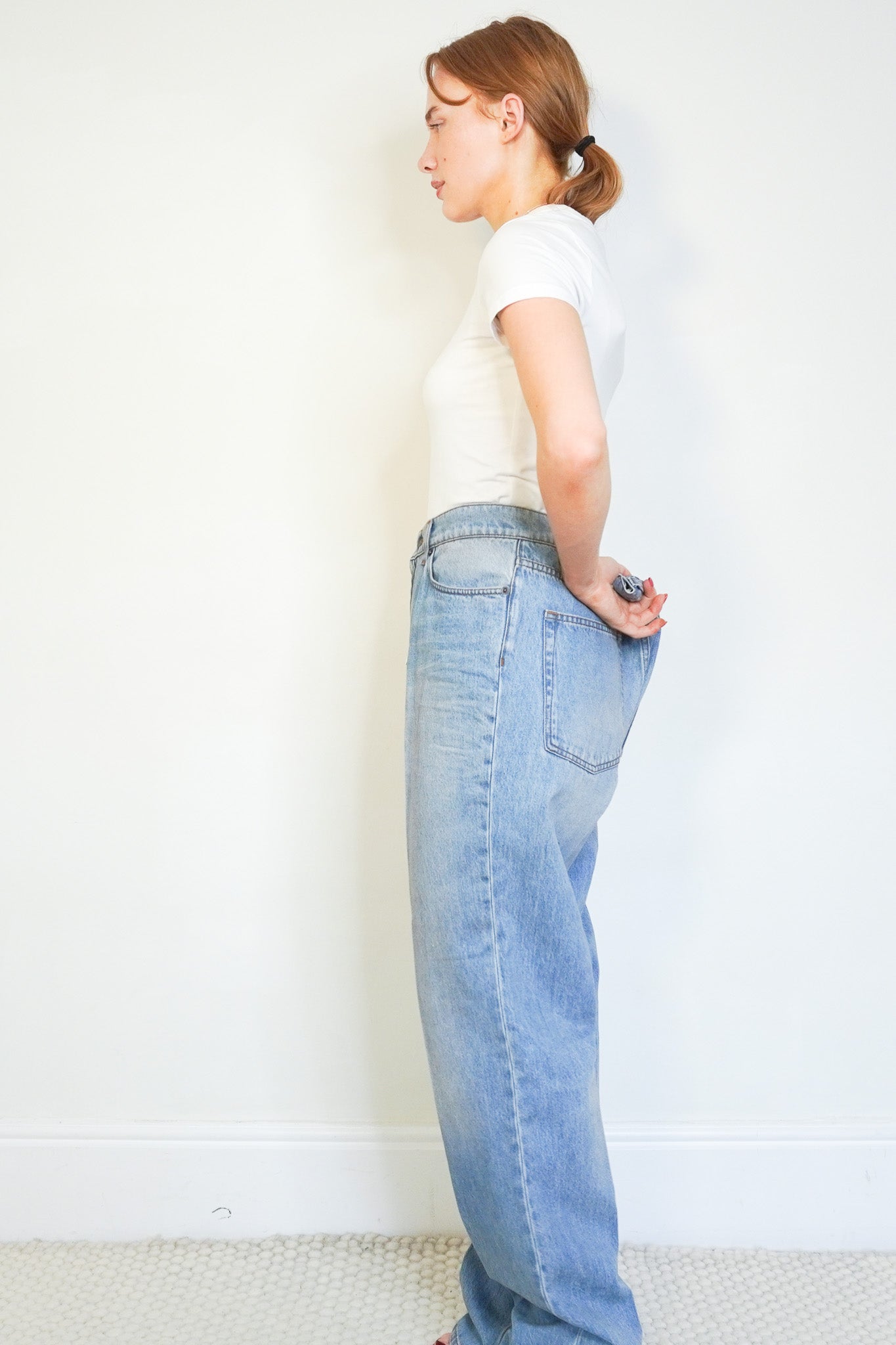 Side image of the NEW The Row Carlton Jeans
