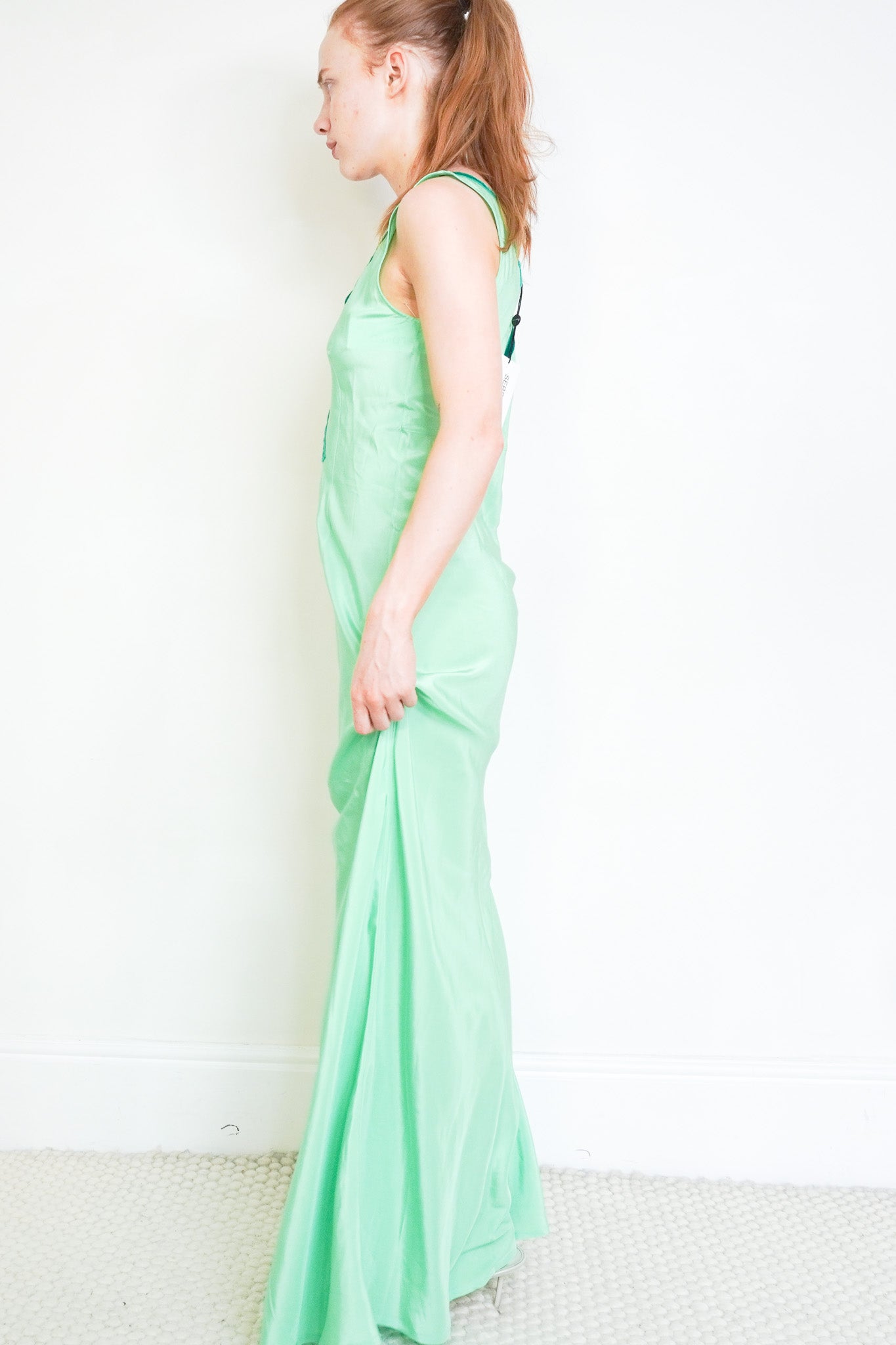 Side image of the Serena Bute V Neck Green Dress 