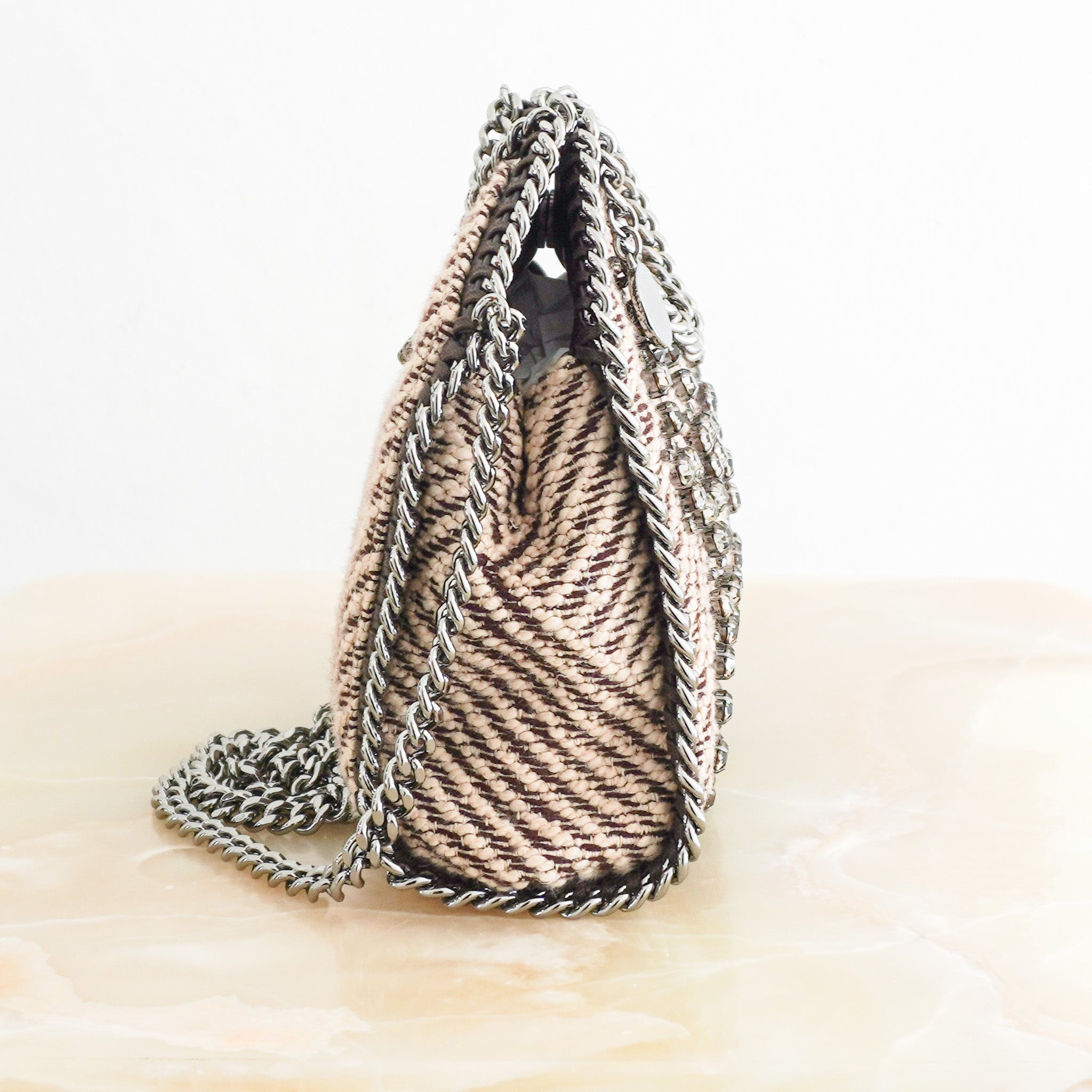 Side image of the Stella McCartney Mini Embellished Falabella Bag 