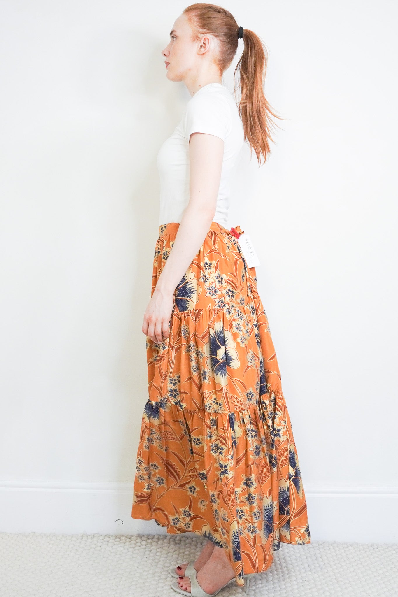 Side image of the Ulla Johnson Ochre Silk Skirt 